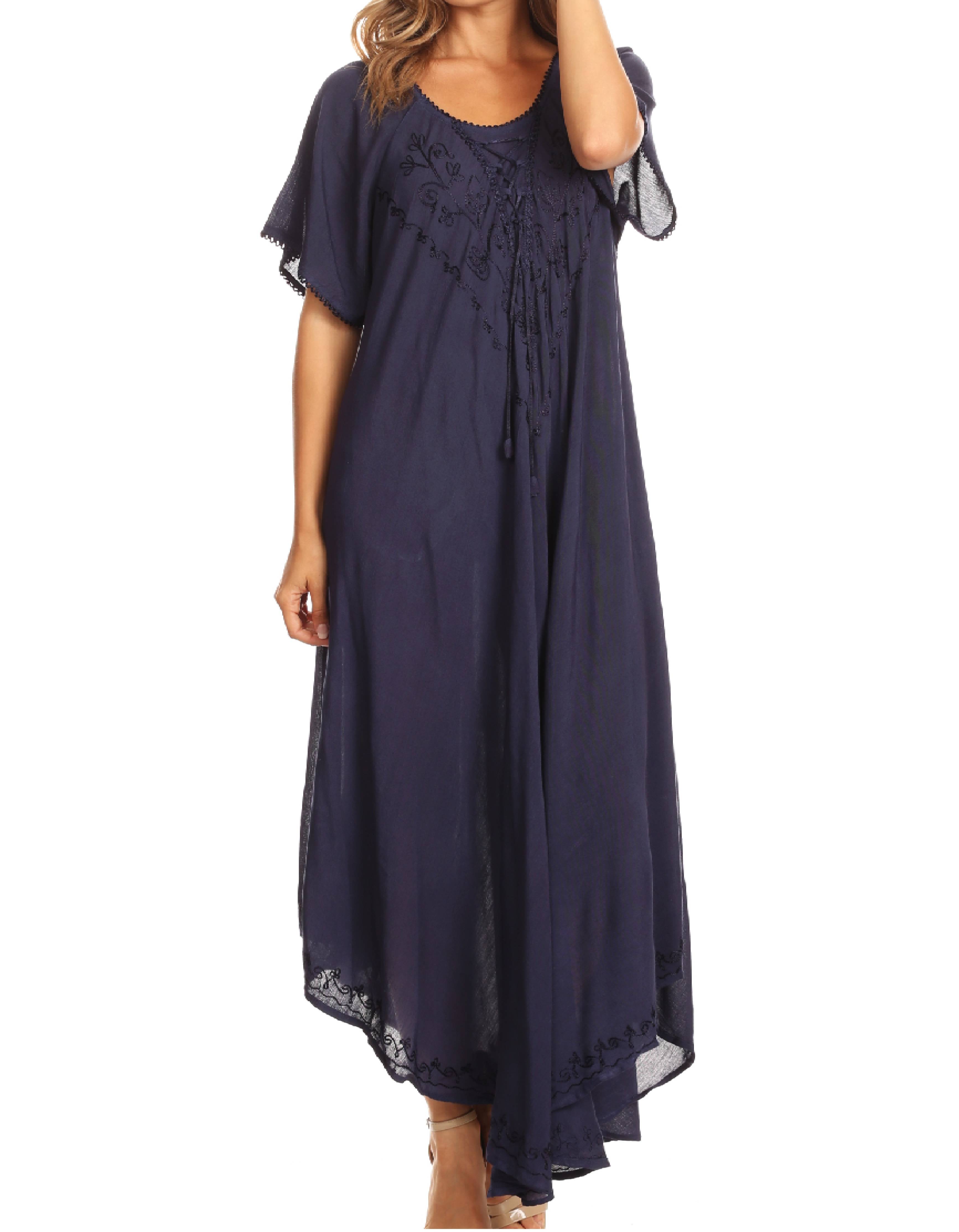 Navy blue dress with lace details on a white background