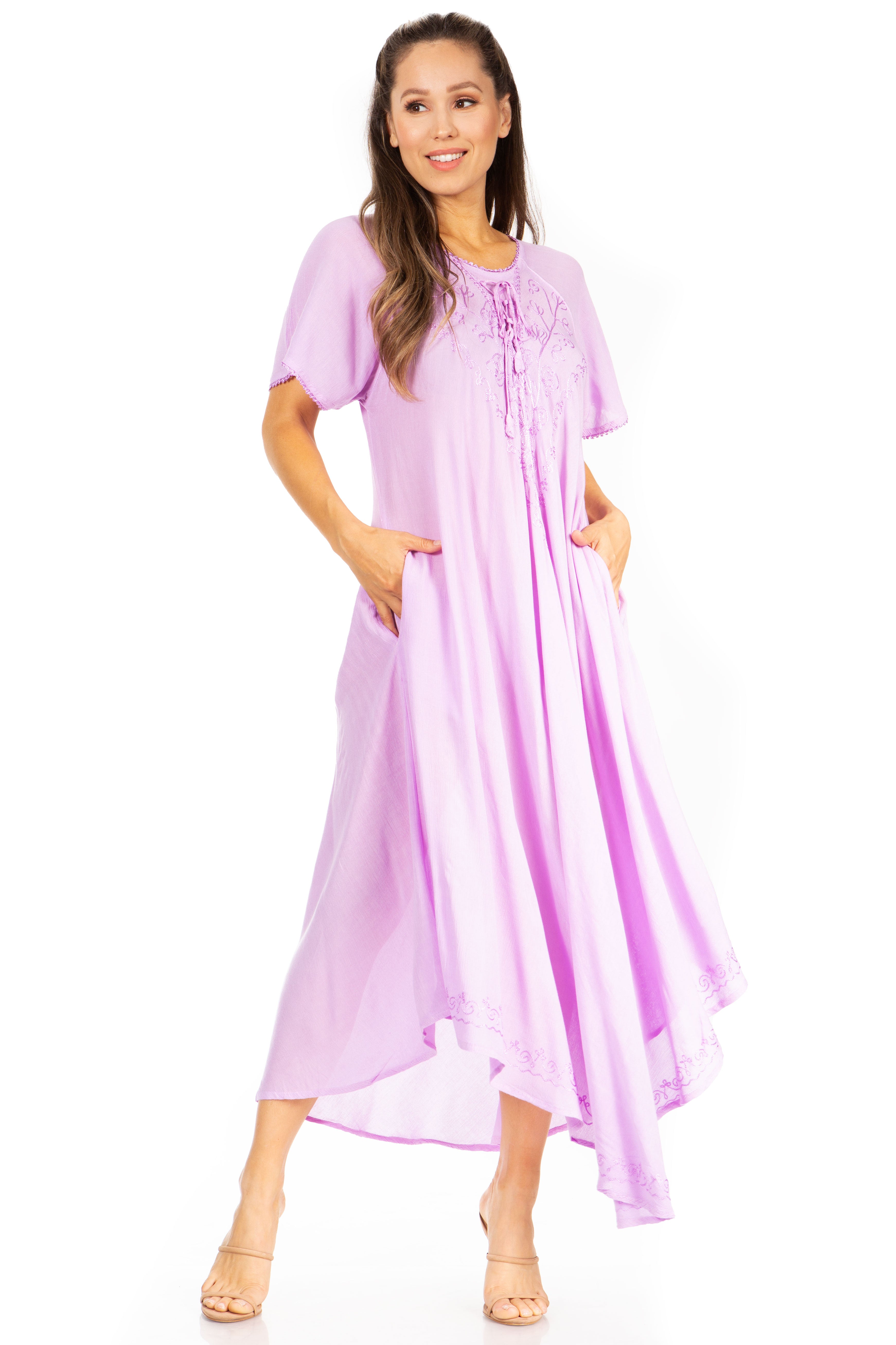 Woman wearing a long purple dress on a white background