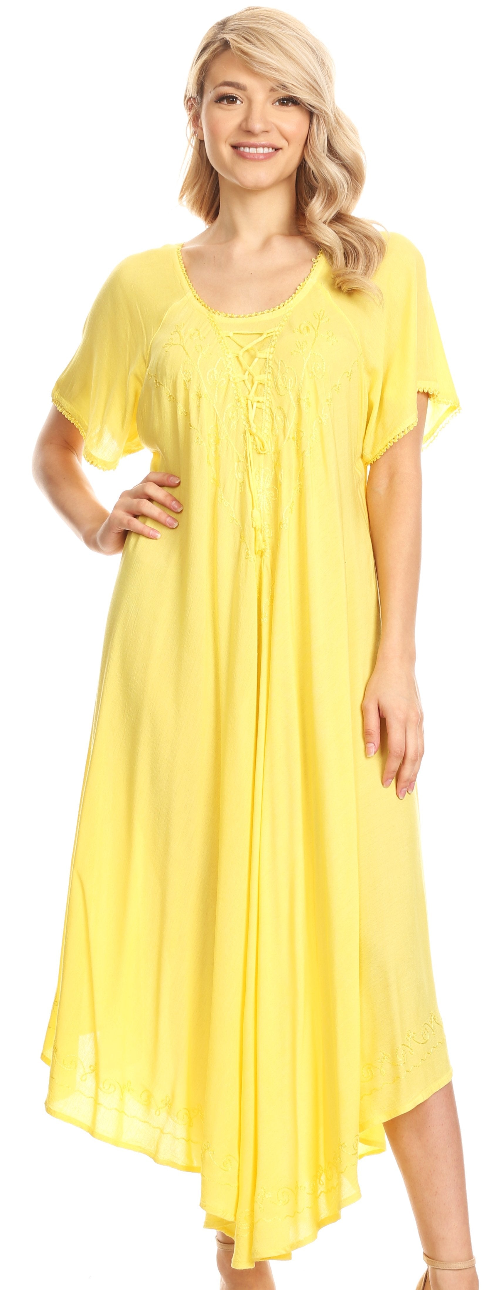 Woman wearing a yellow dress with a soft background