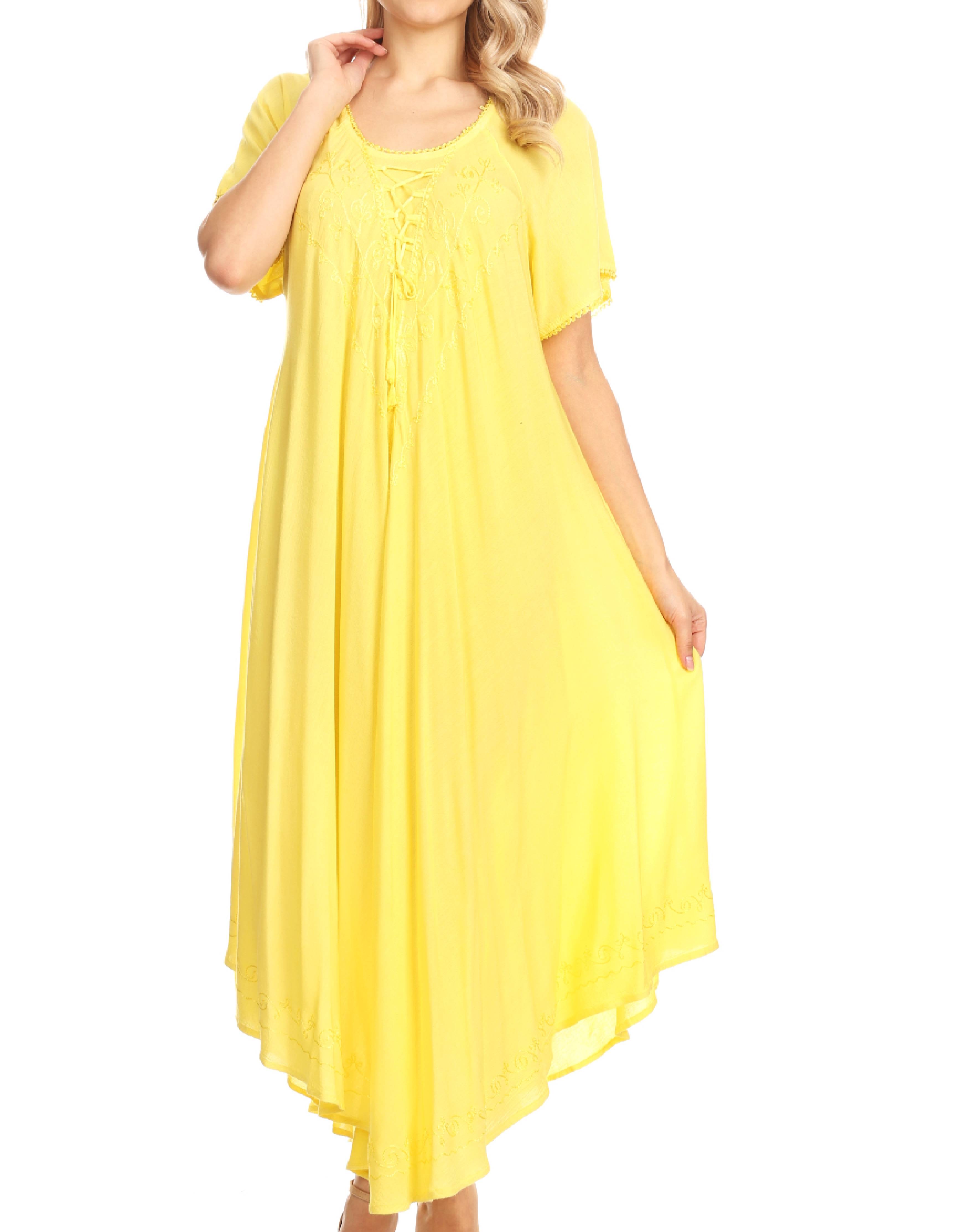 Yellow dress worn by a model on a white background