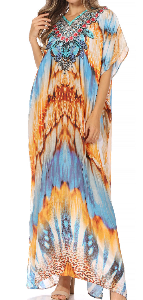 Colorful patterned dress with embellishments on a white background