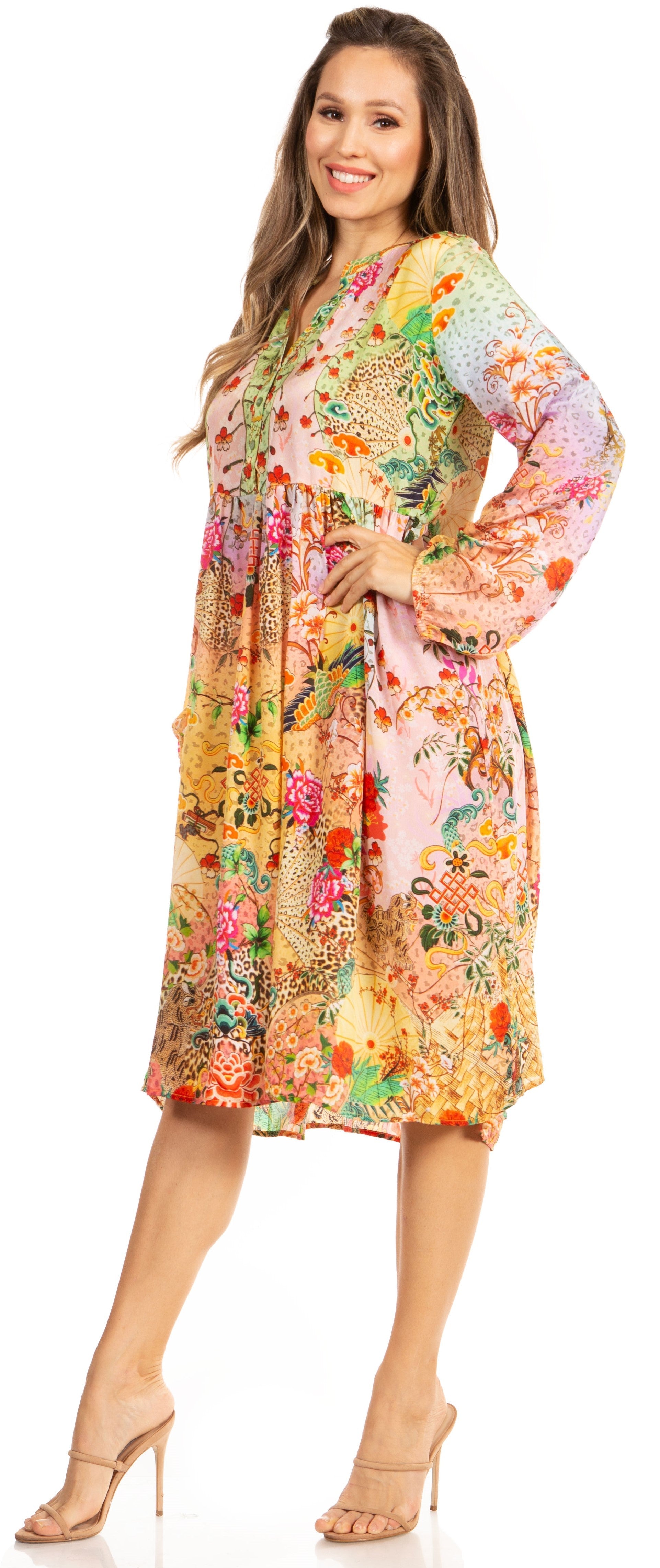 Woman wearing a colorful floral dress on a white background