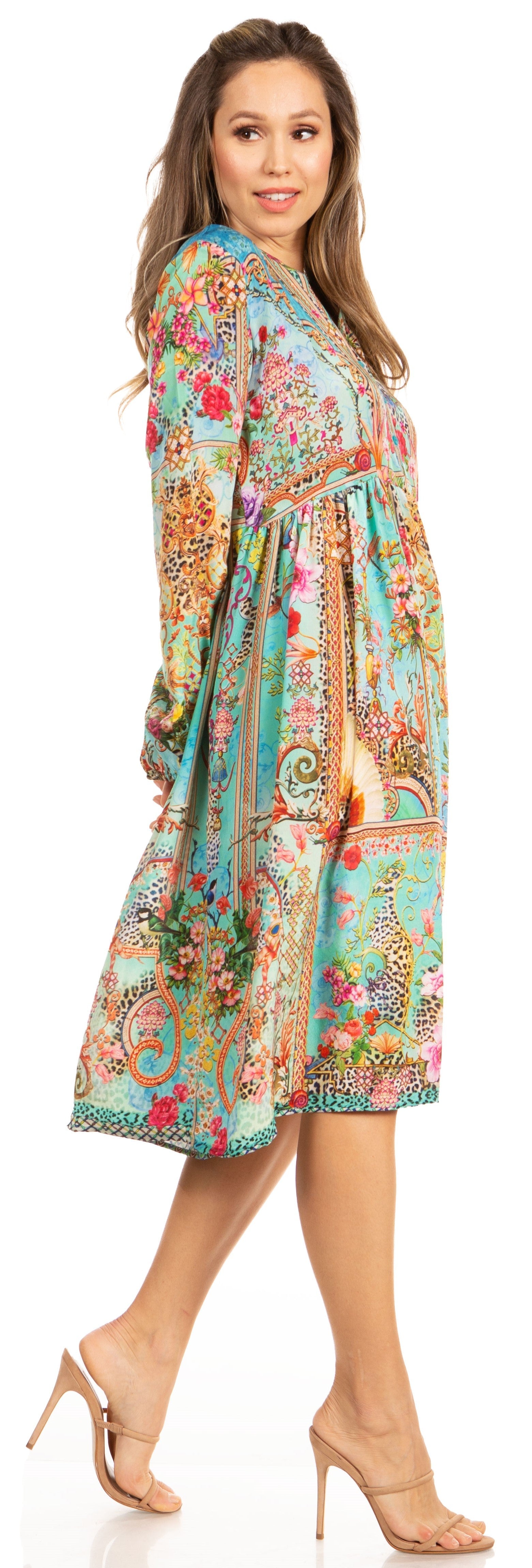 Woman wearing a colorful floral dress on a white background