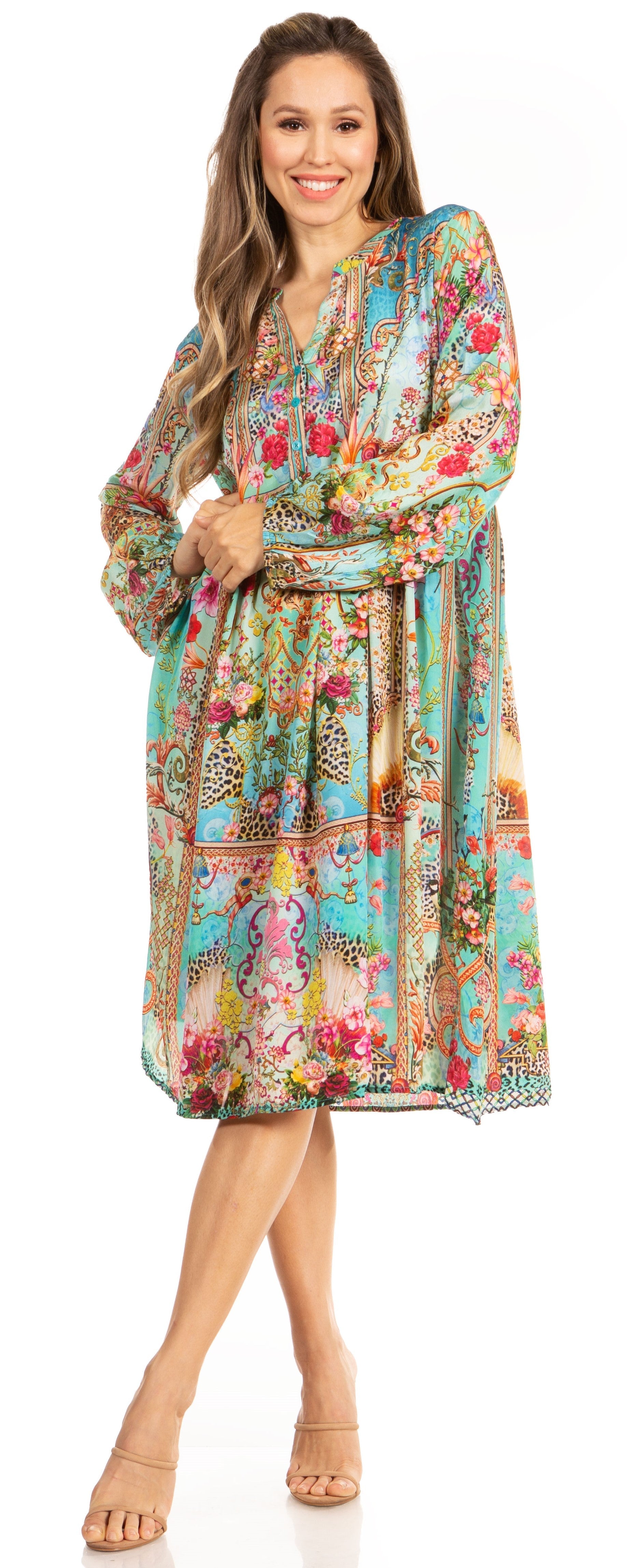 Woman wearing a colorful patterned dress on a white background