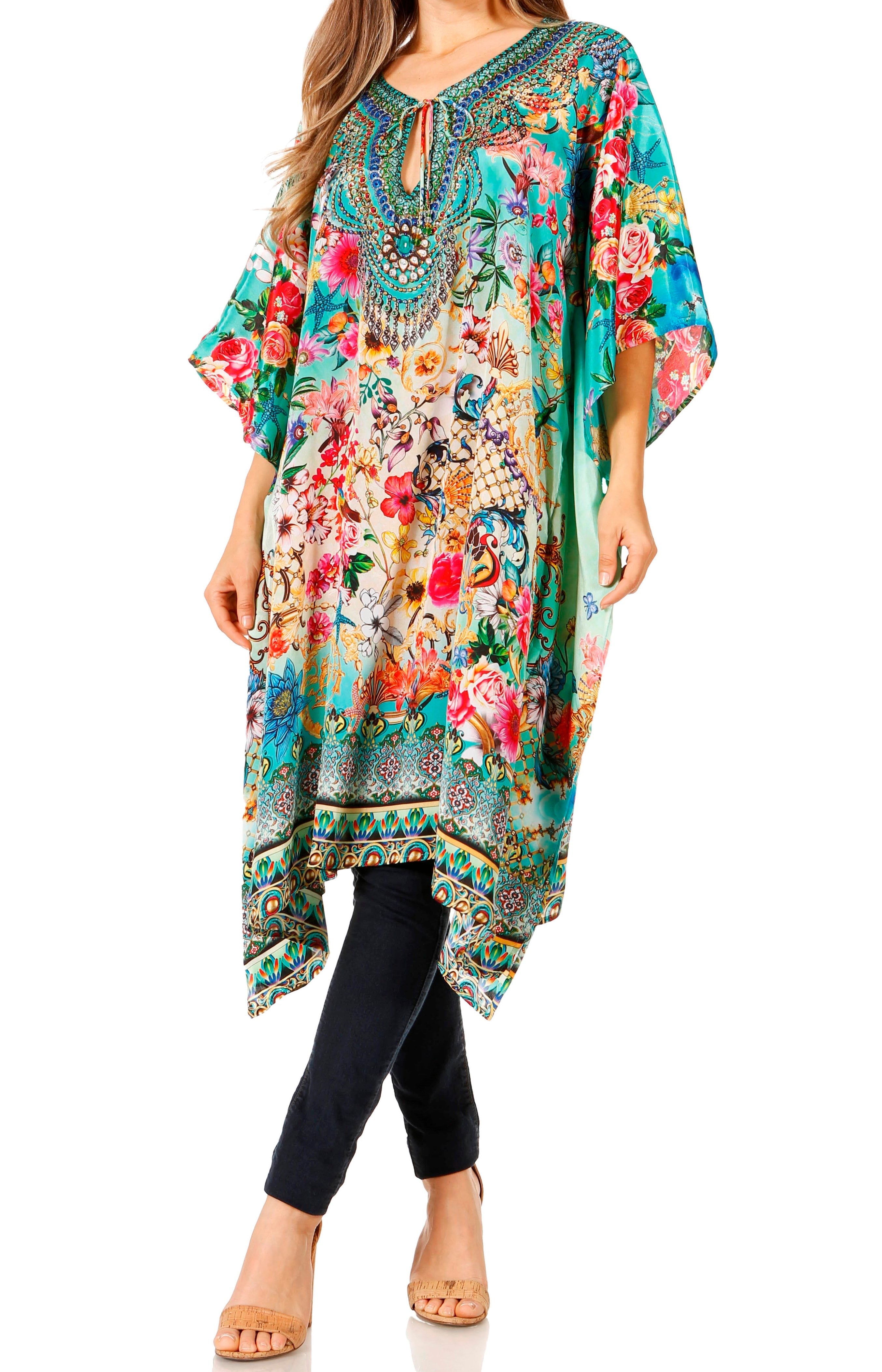 Woman wearing a colorful floral dress with a white background