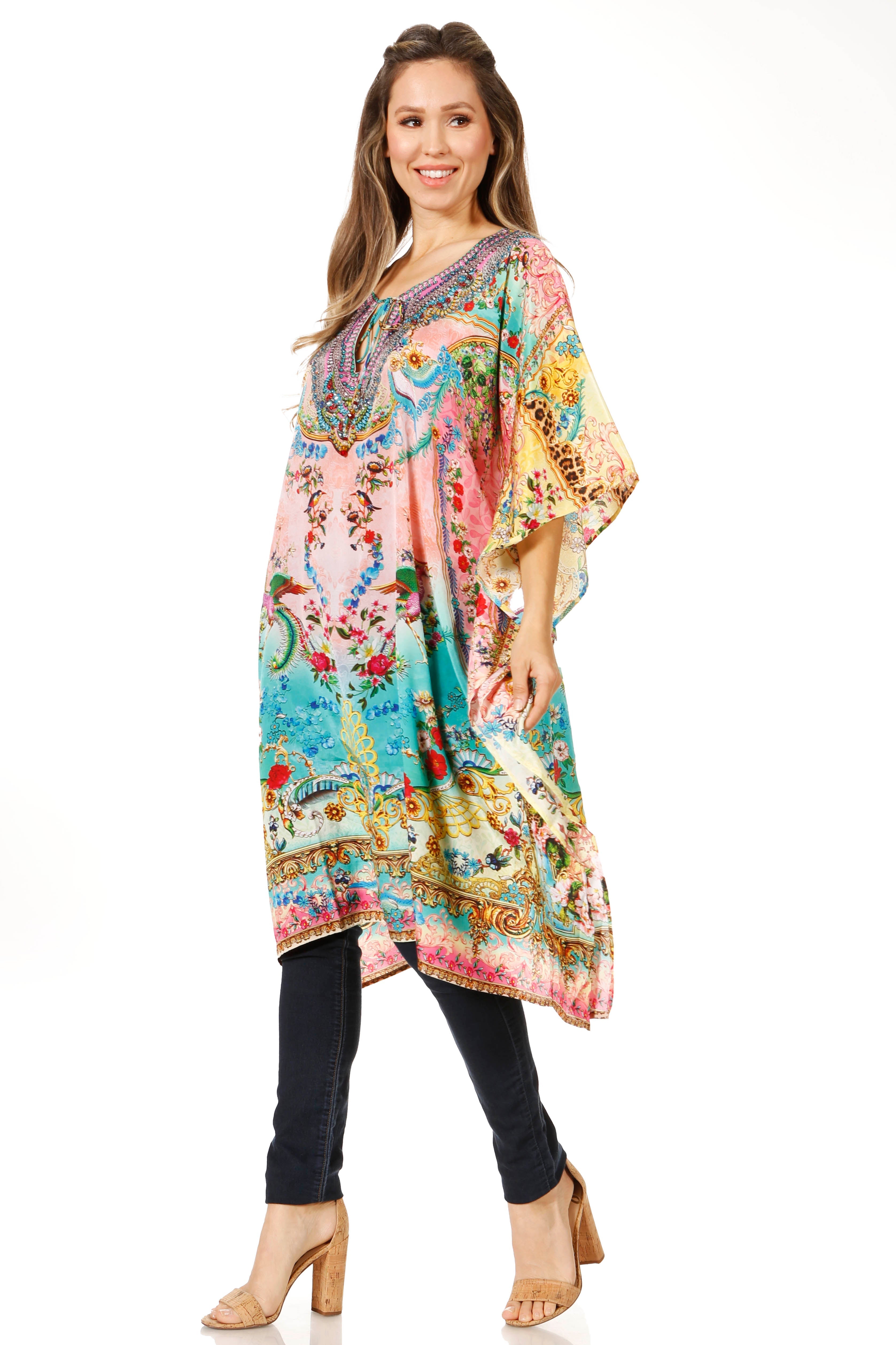 Woman wearing a colorful patterned dress on a white background