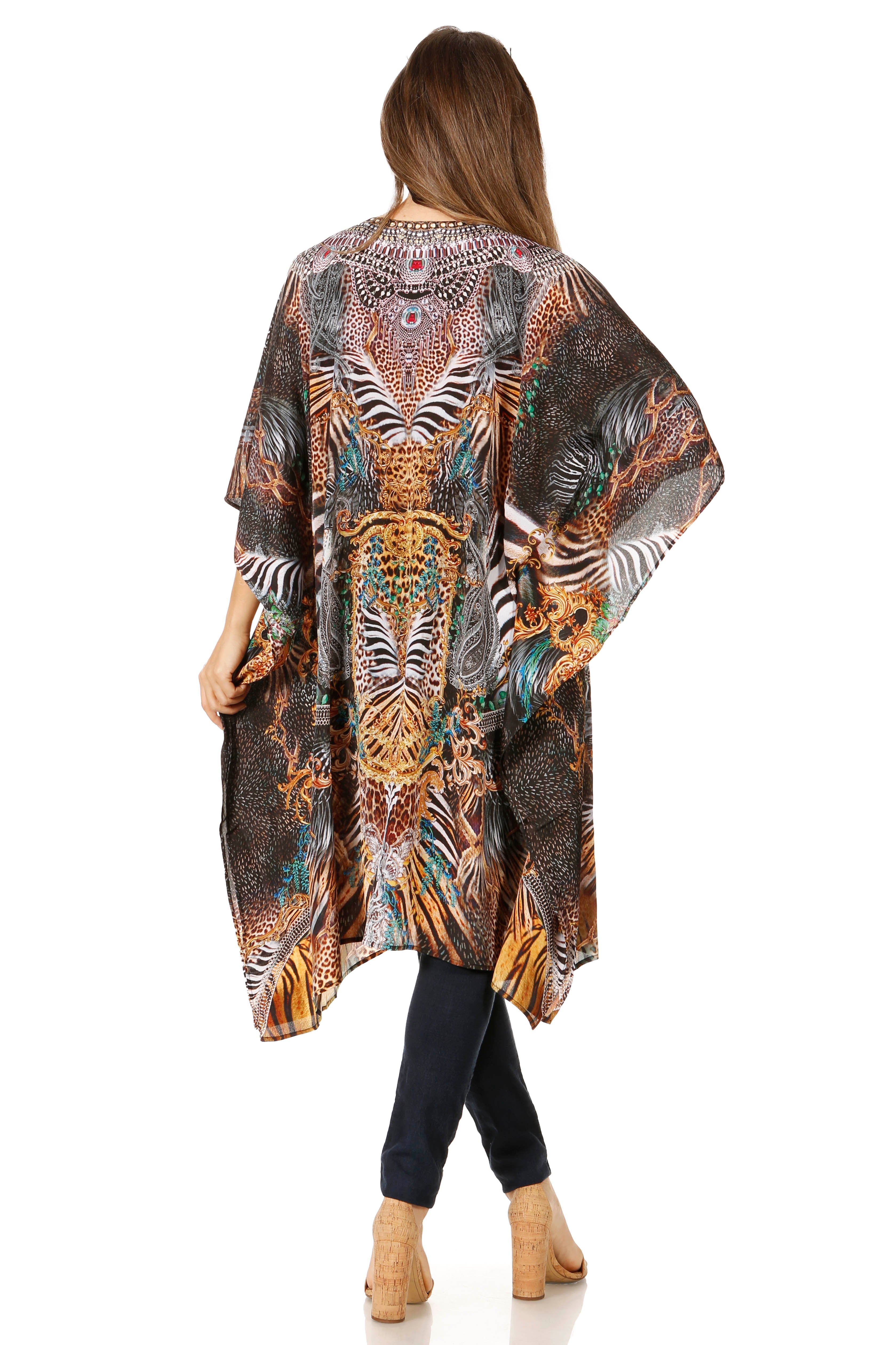 Woman wearing a patterned kimono-style garment on a white background