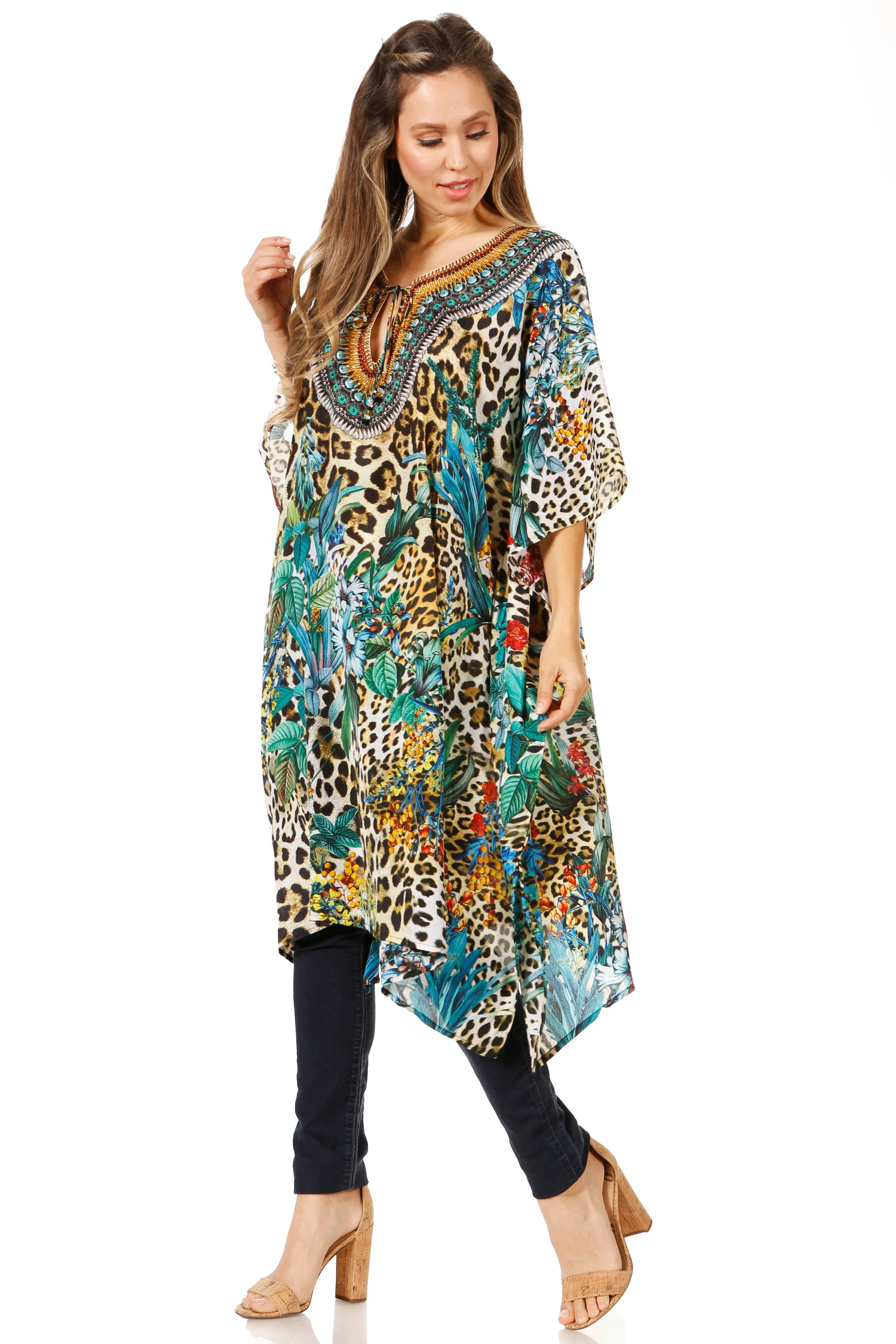 Woman wearing a colorful patterned dress on a white background