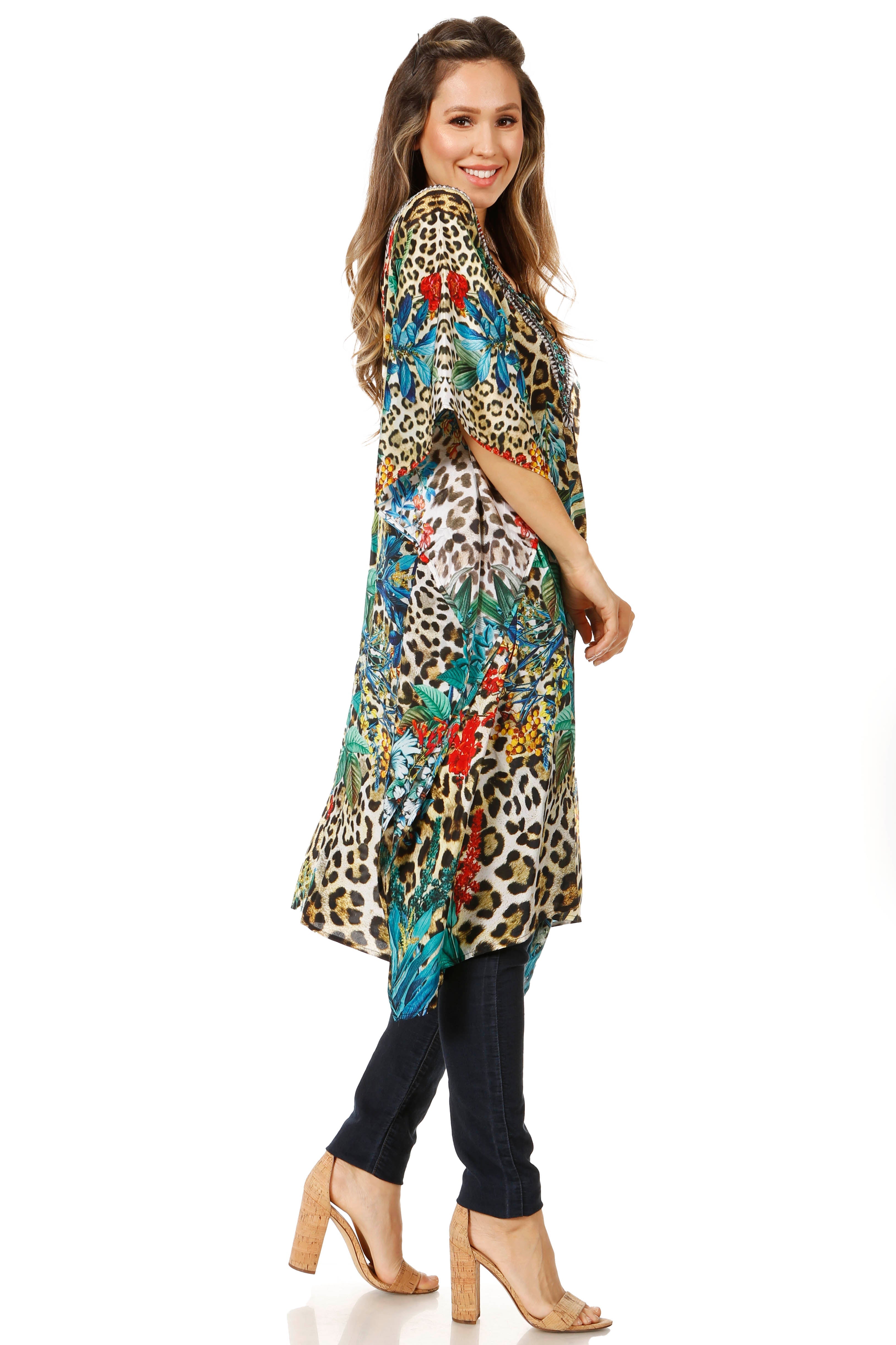 Woman wearing a colorful patterned kimono on a white background