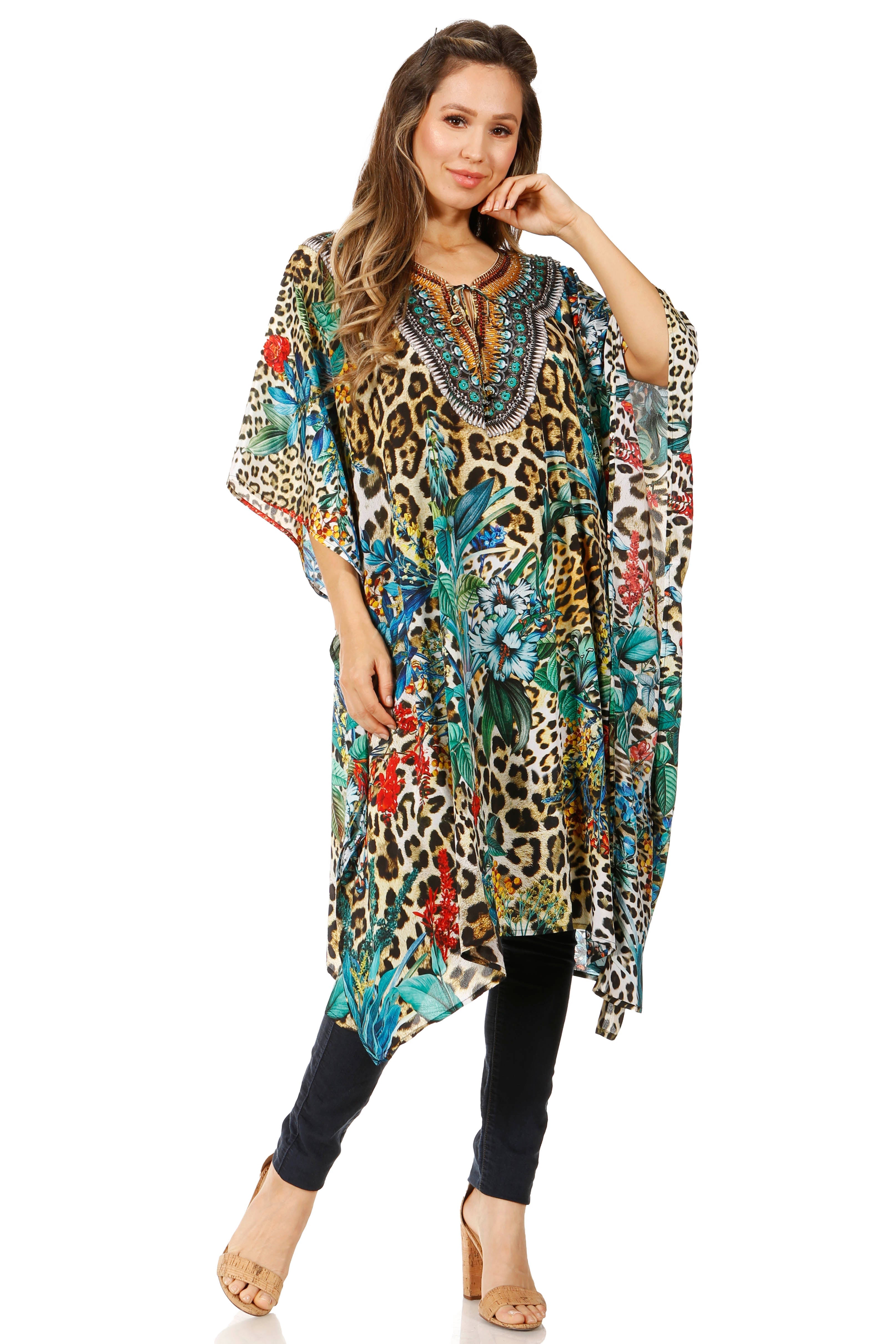 Woman wearing a colorful patterned dress on a white background