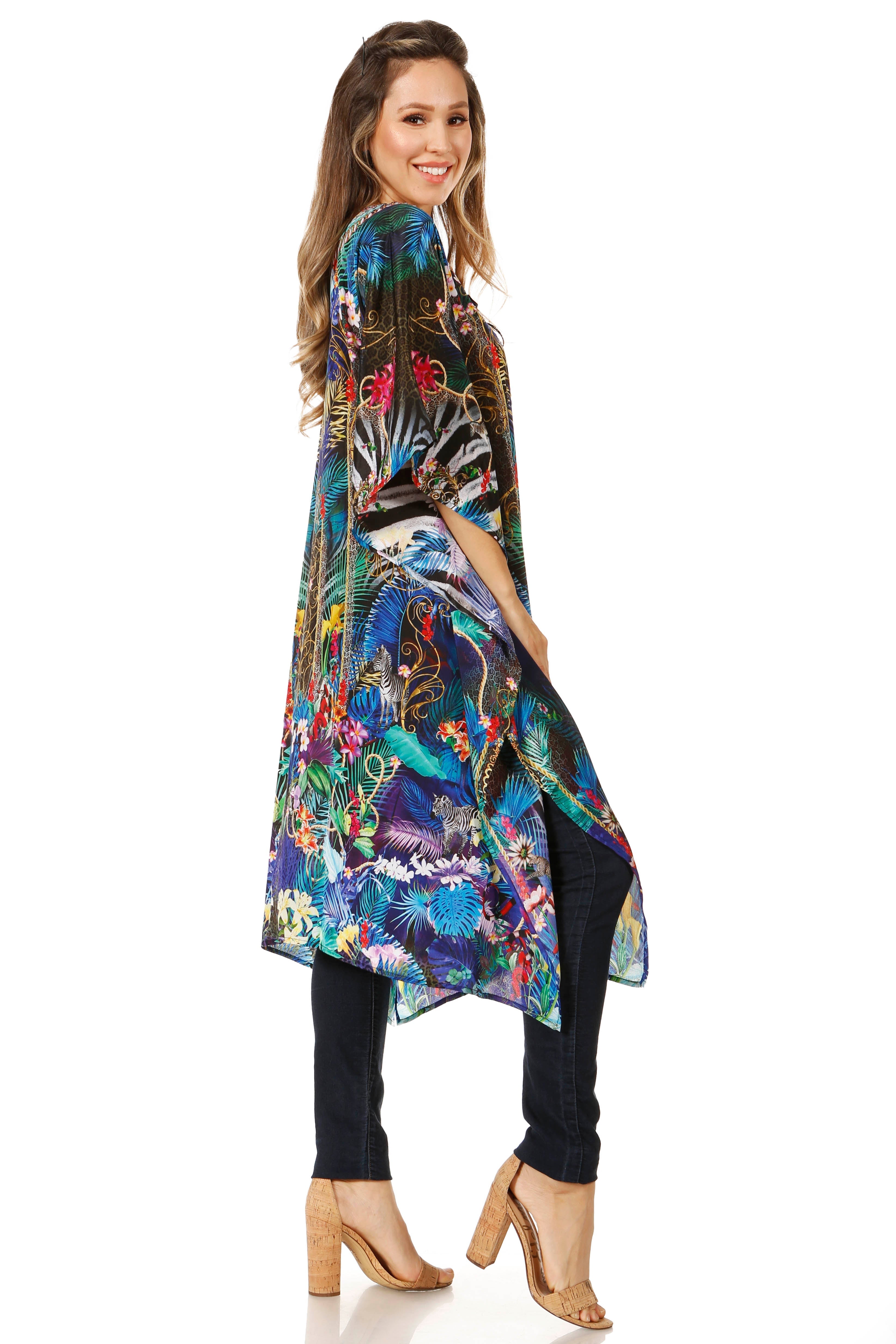 Woman wearing a colorful floral dress on a white background