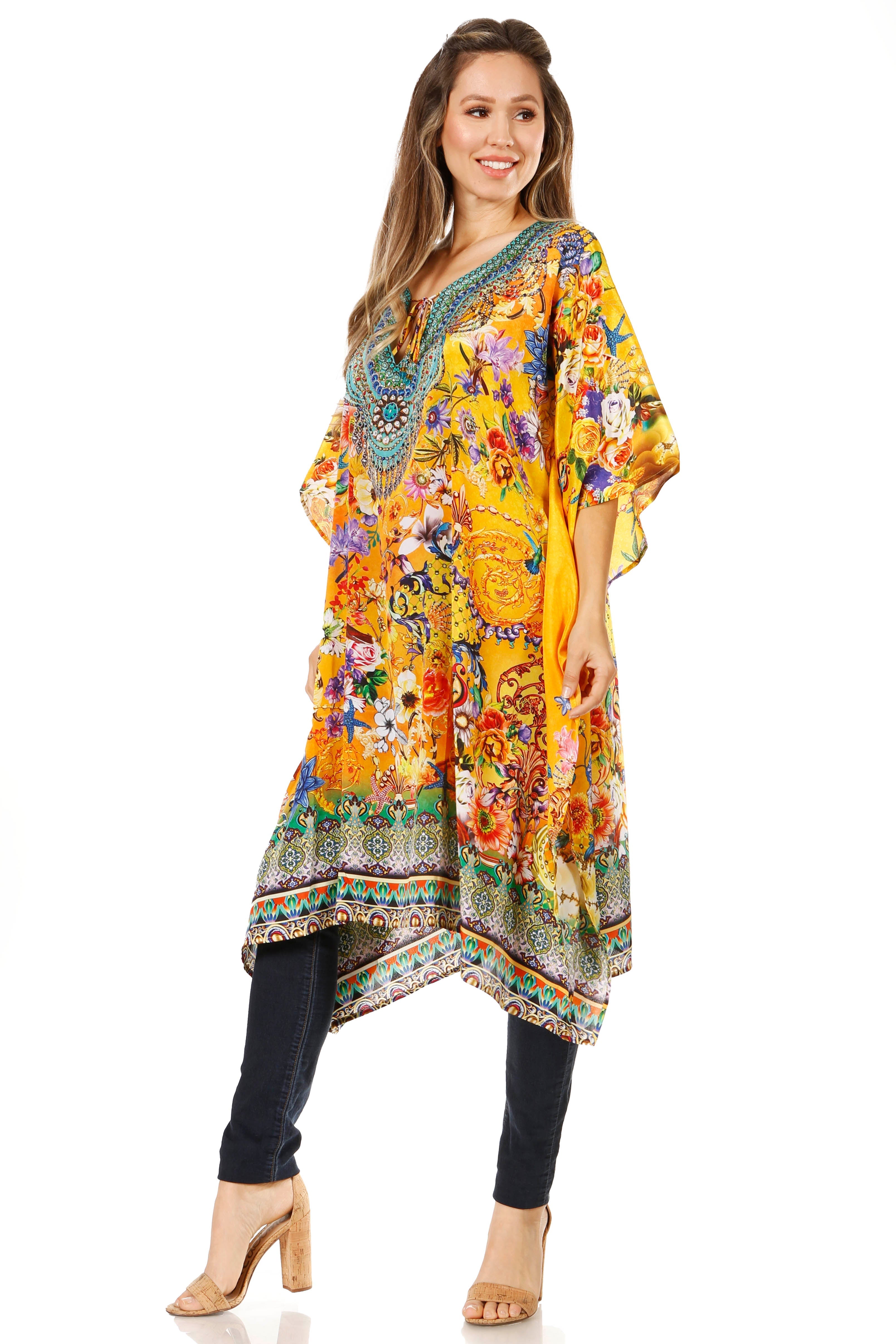 Woman wearing a colorful floral dress with a white background