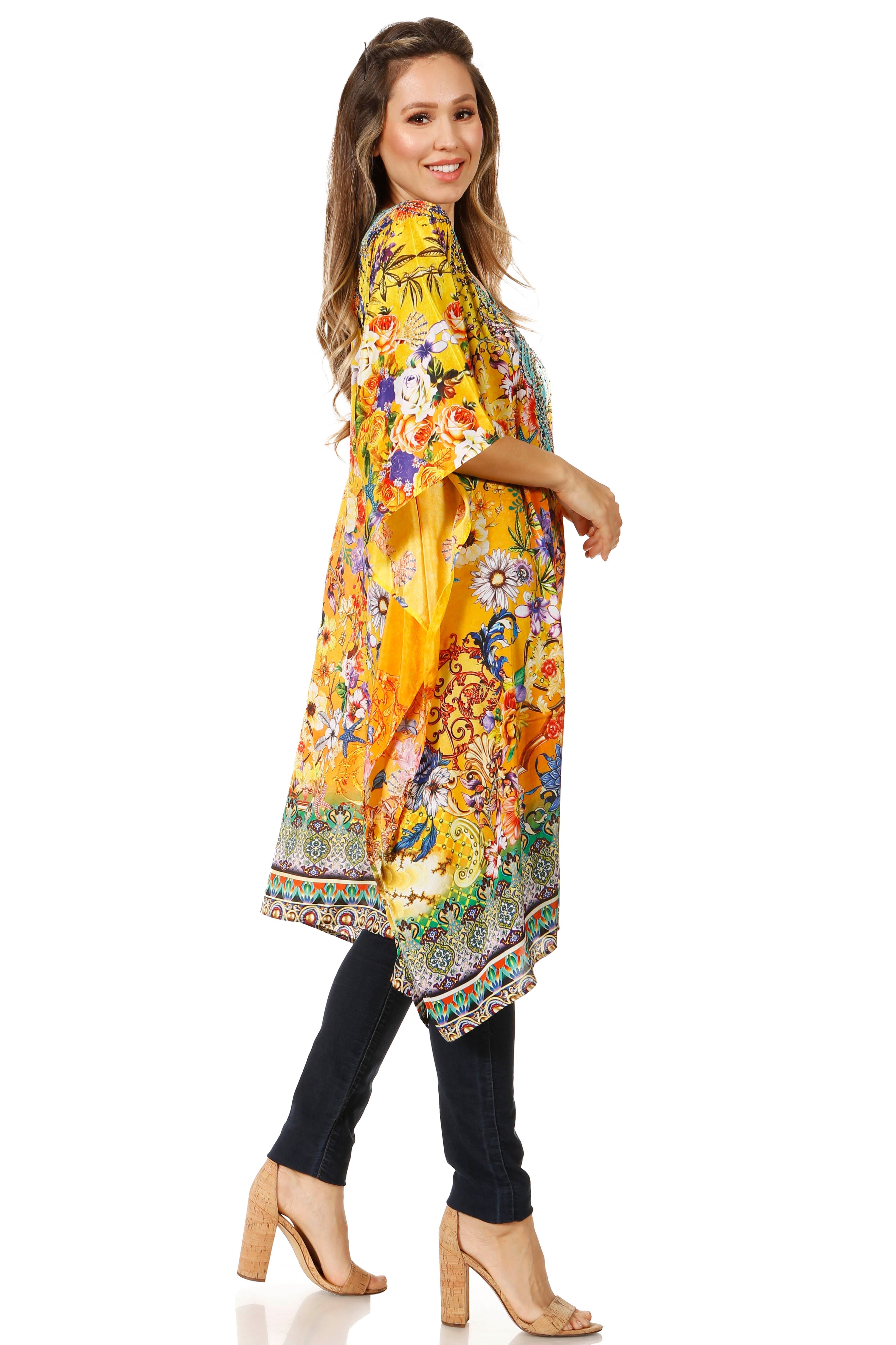 Woman wearing a colorful floral dress with a yellow background