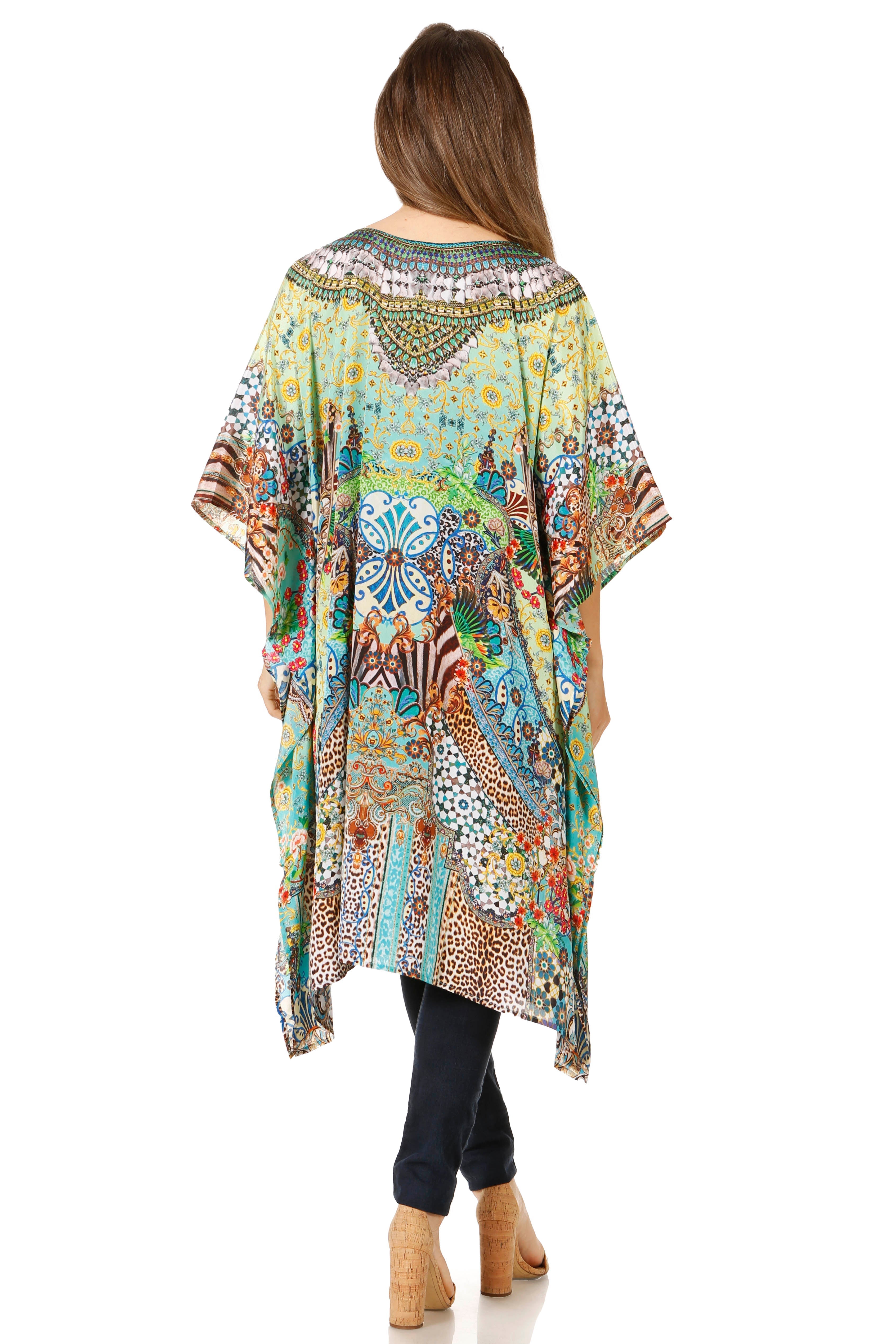 Woman wearing a colorful patterned kimono-style garment on a white background
