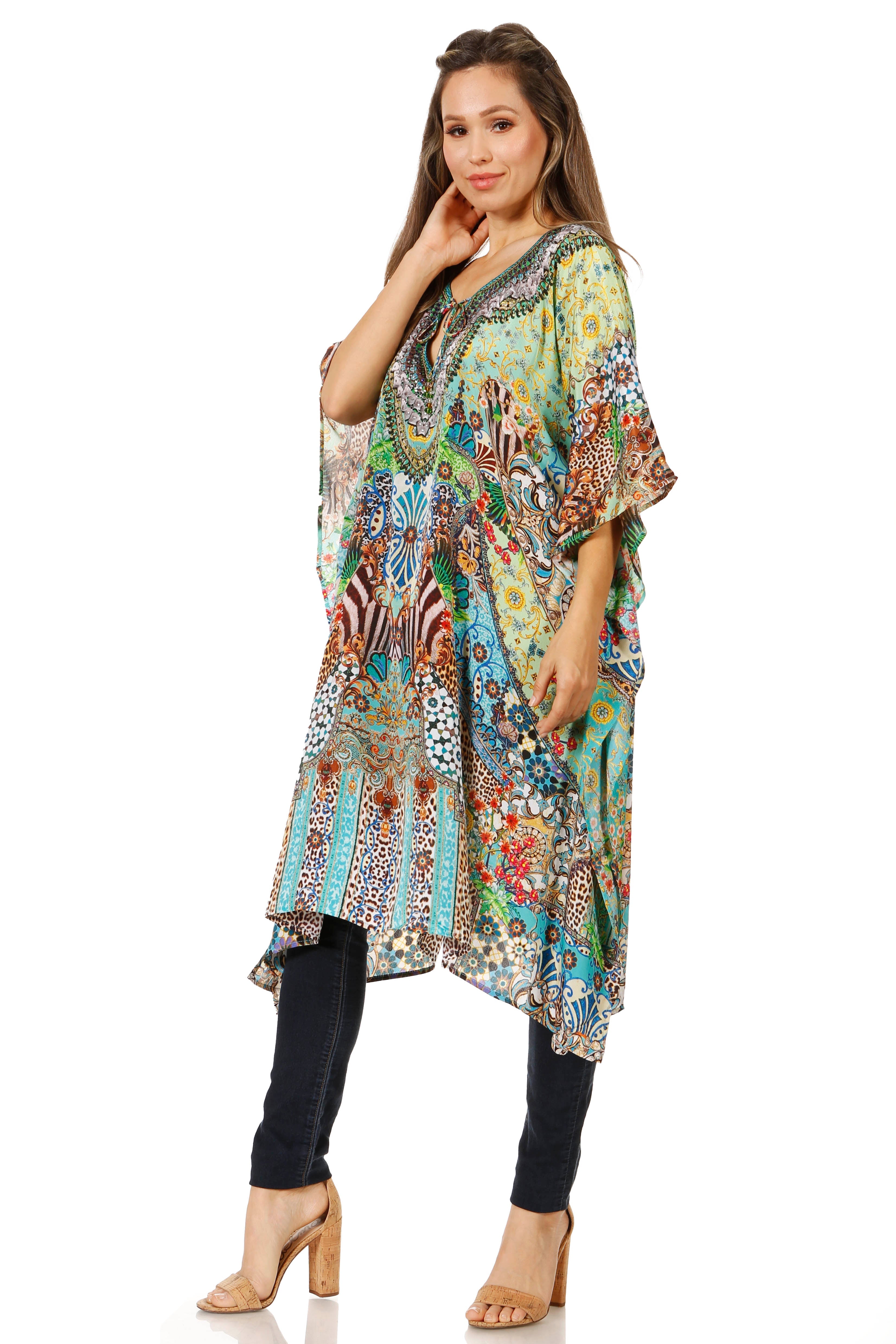 Woman wearing a colorful patterned kimono-style garment on a white background