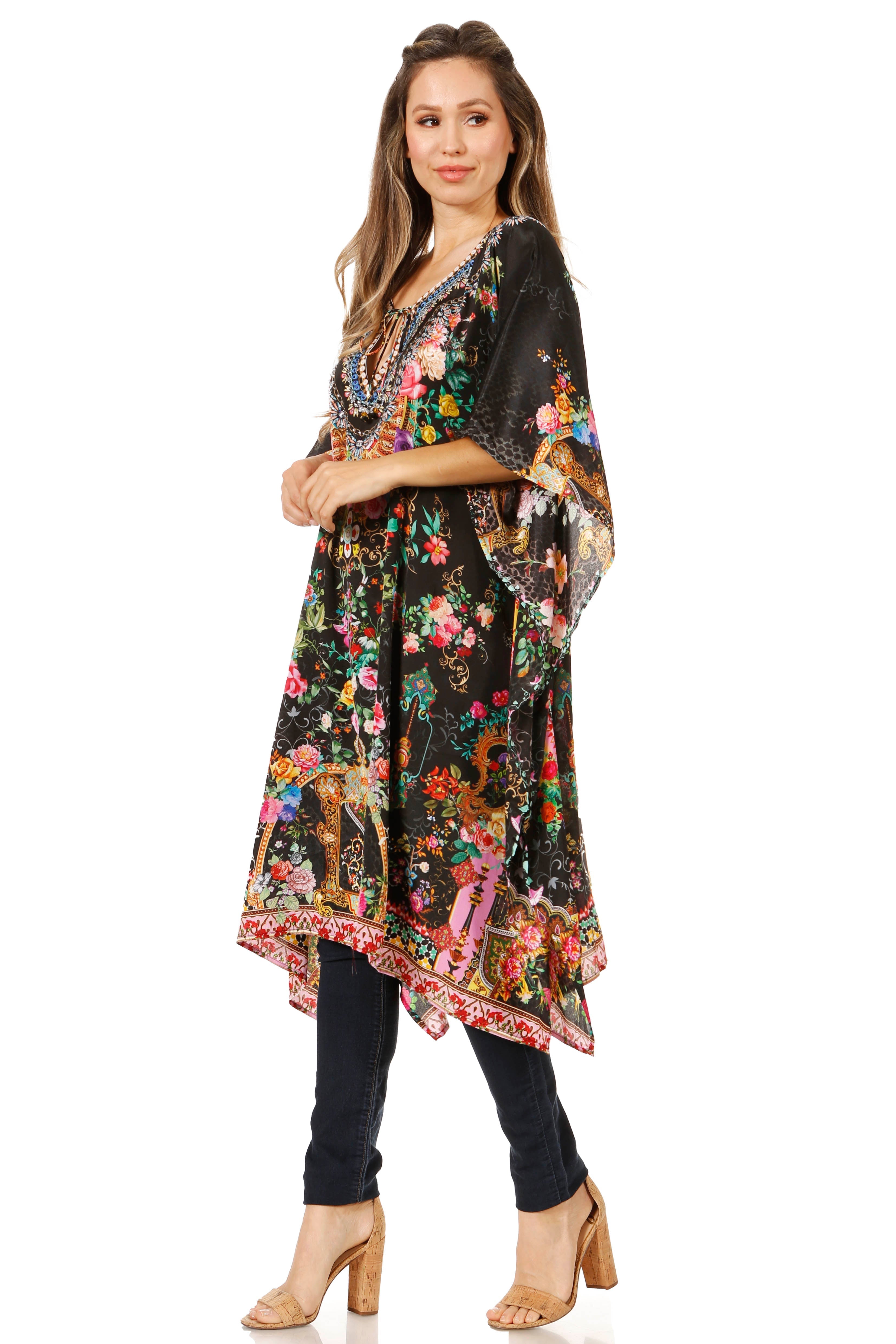 Woman wearing a floral kimono-style garment on a white background