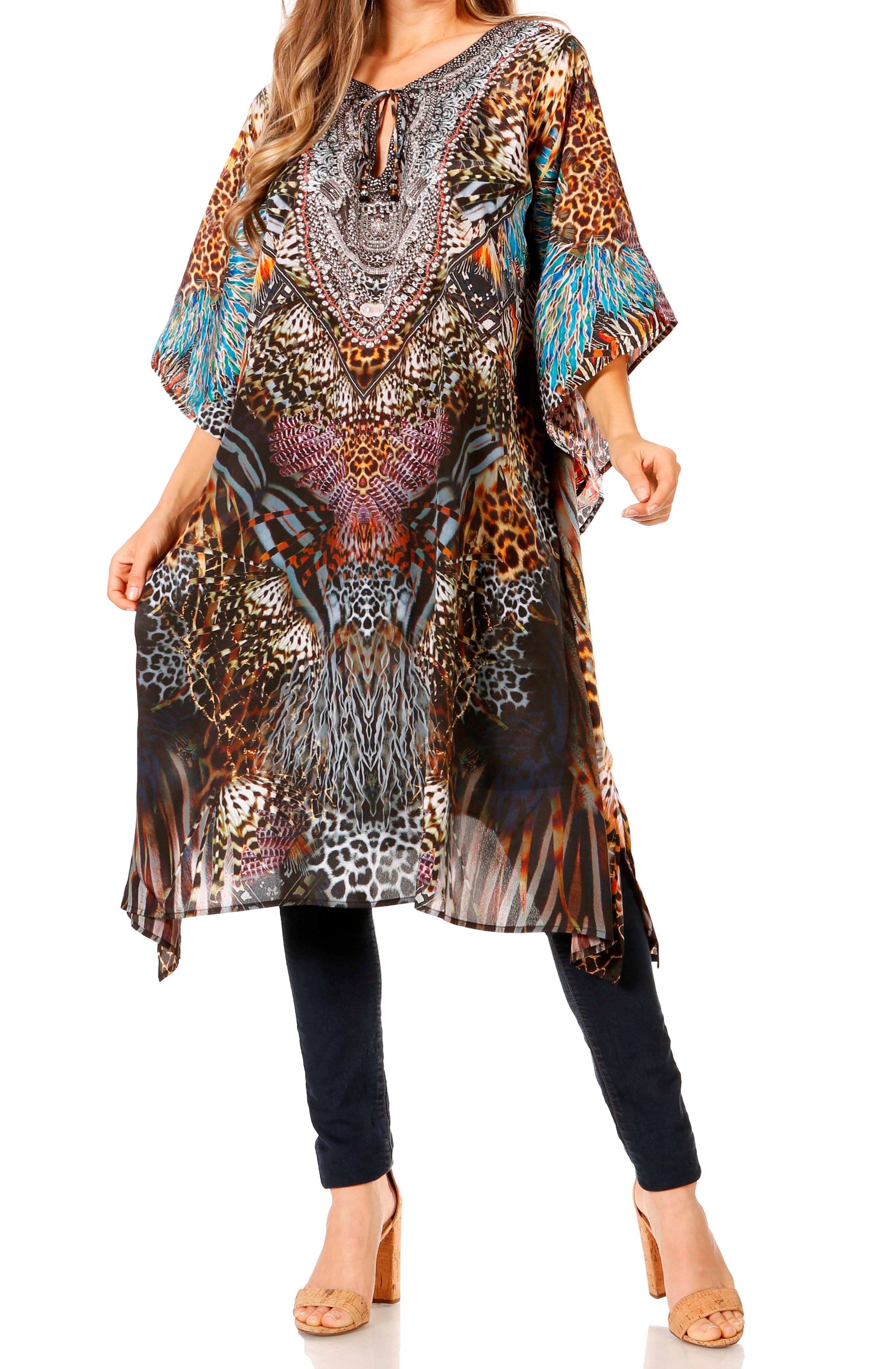 Woman wearing a long, patterned dress with a white background