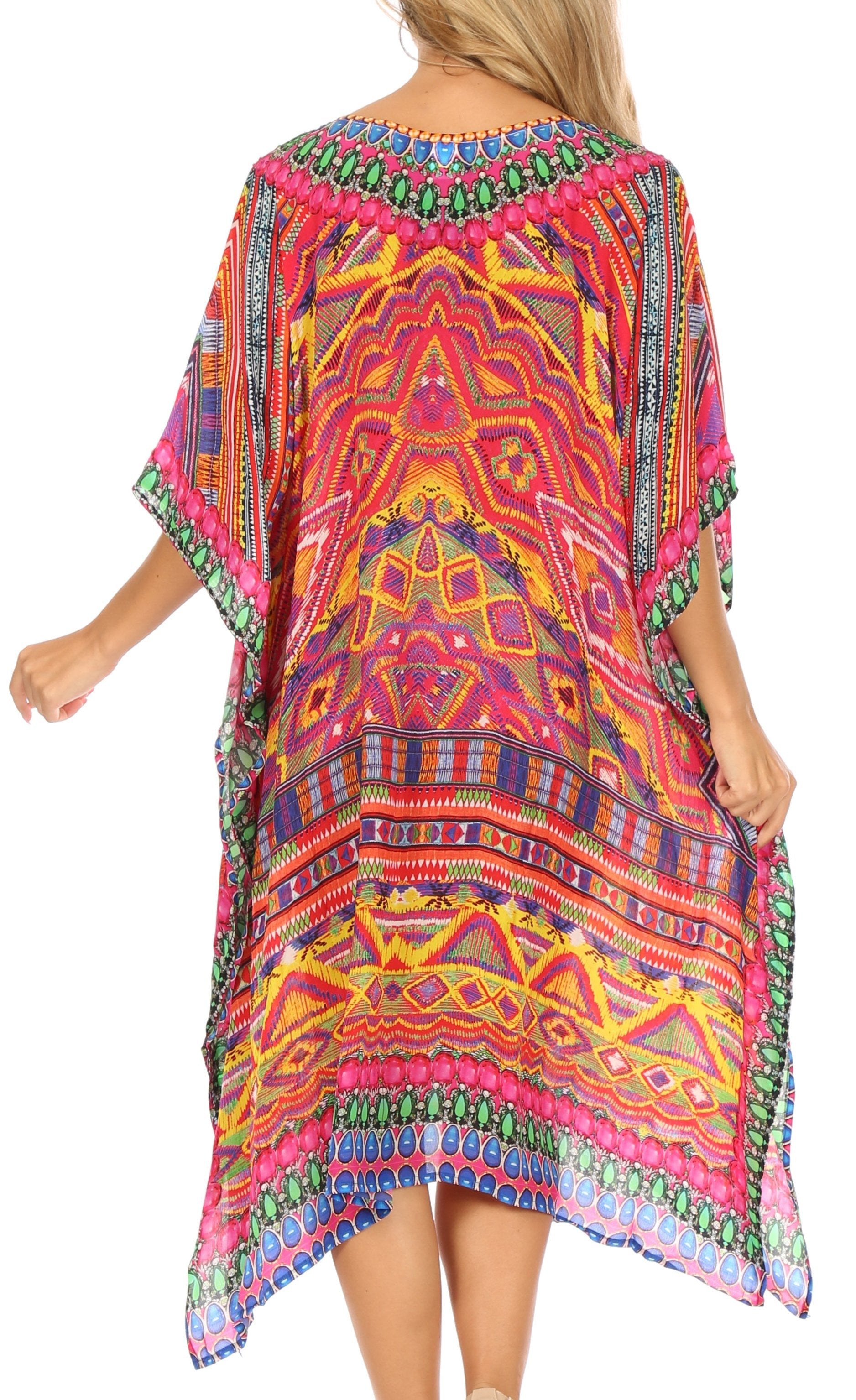Colorful patterned dress worn by a person on a white background
