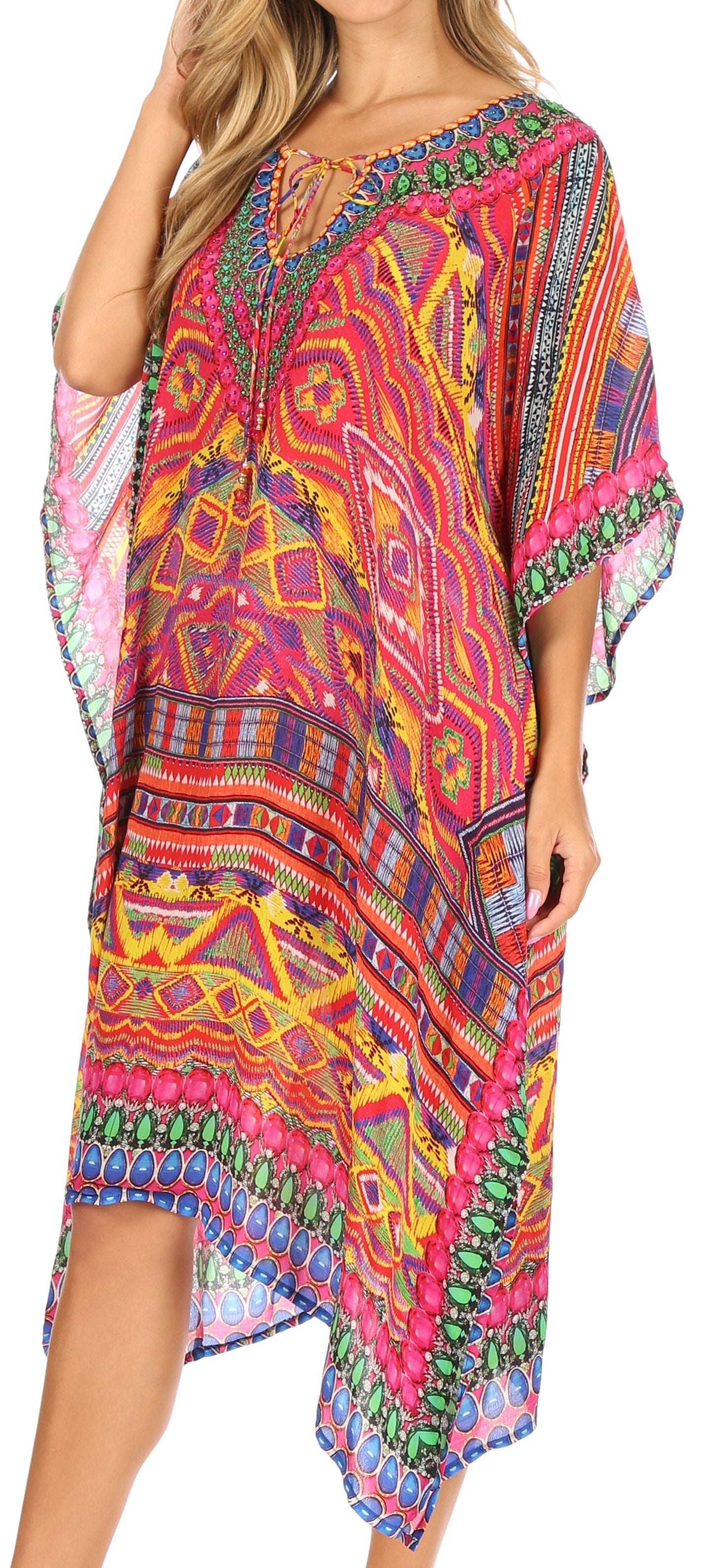Colorful patterned dress worn by a model against a neutral background