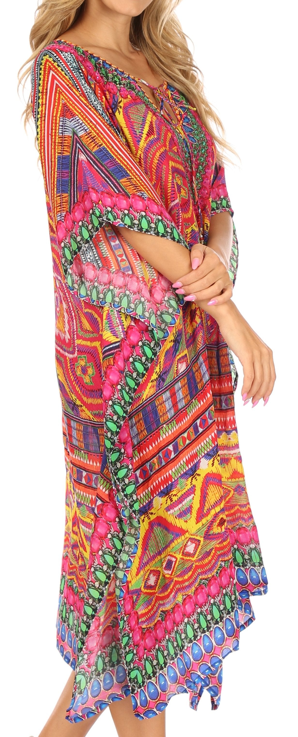 Woman wearing a colorful patterned dress with a vibrant design.
