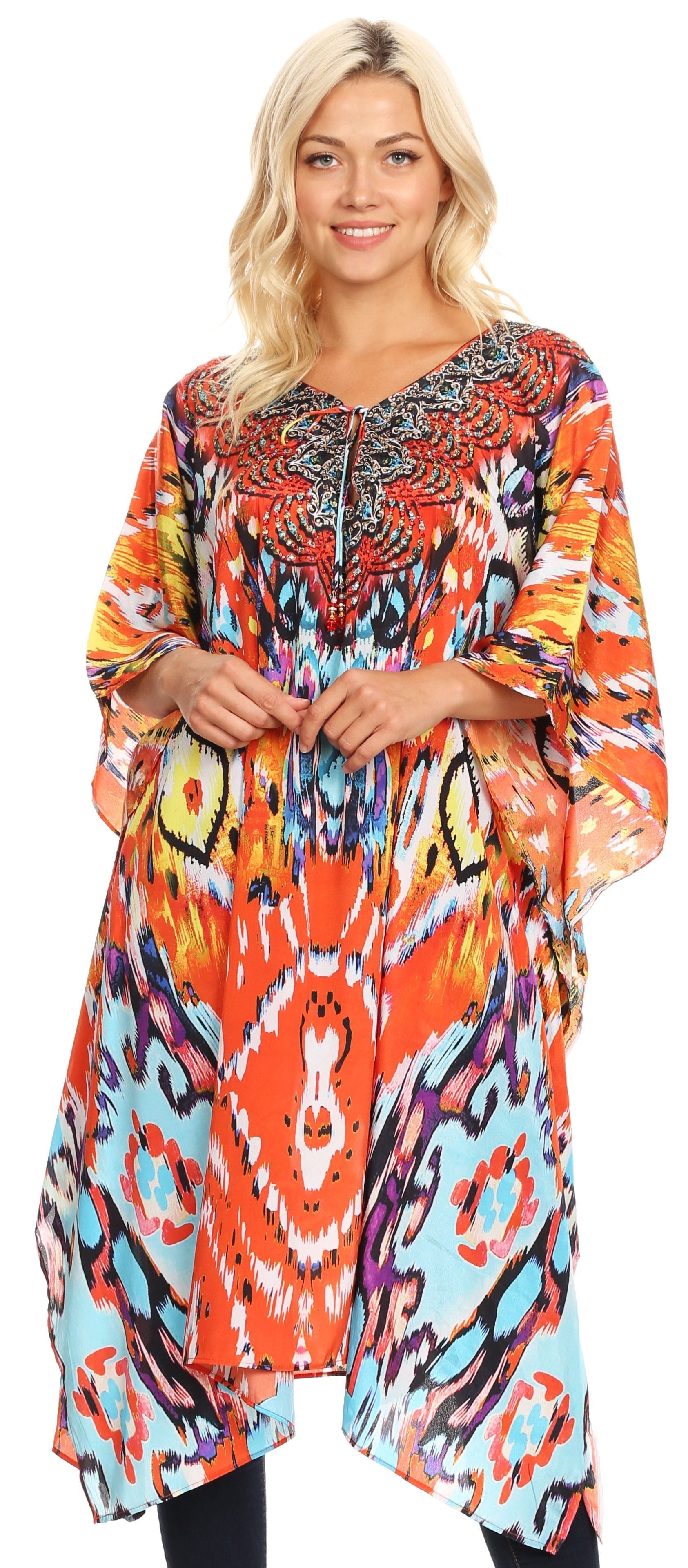 Woman wearing a colorful patterned dress on a white background