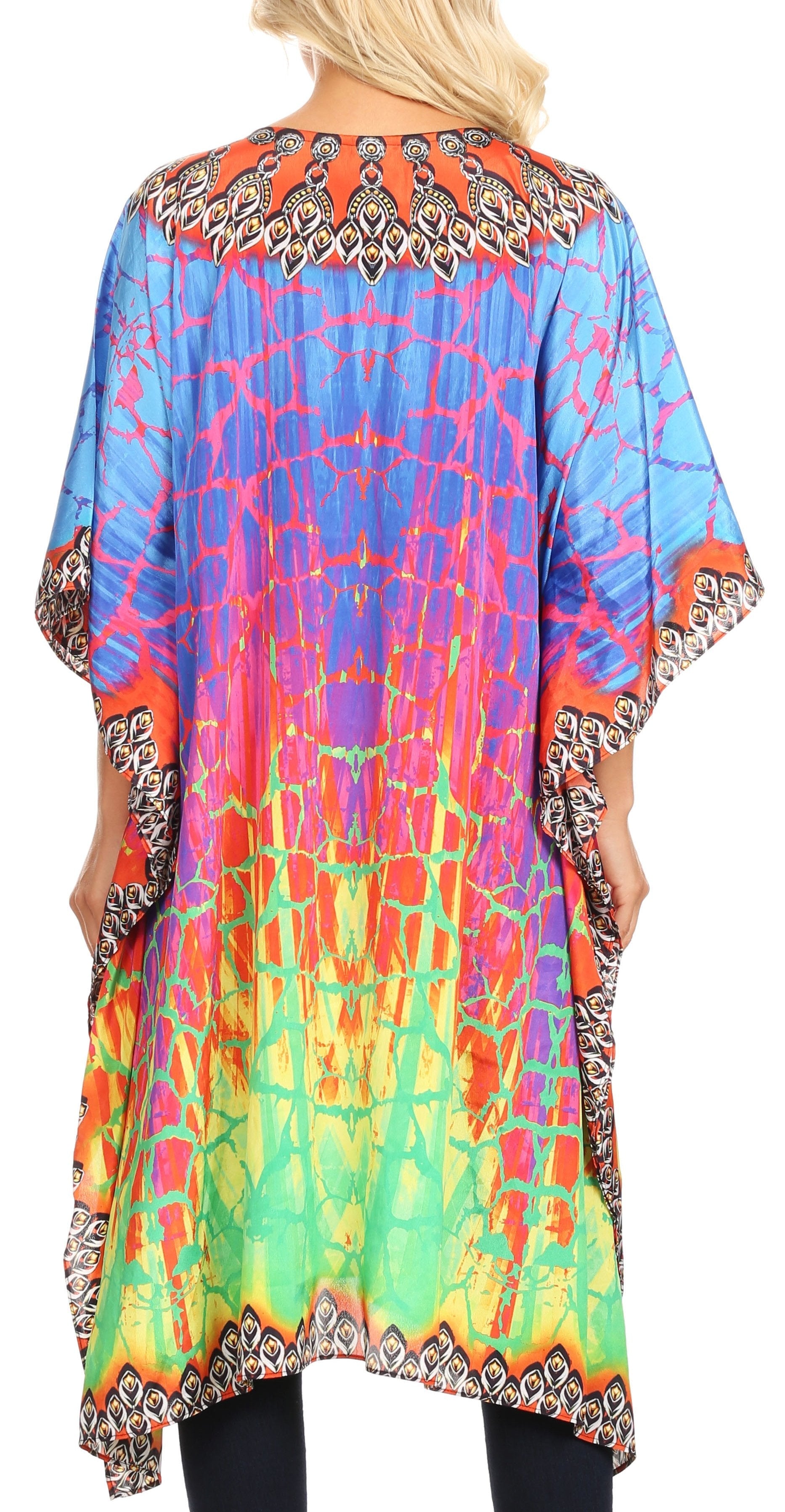 Colorful tie-dye dress with patterned trim on a white background
