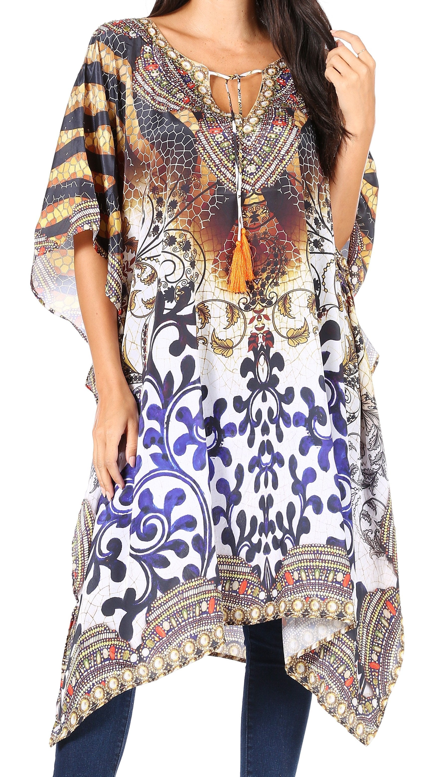 Woman wearing a patterned kaftan with a tassel necklace on a white background