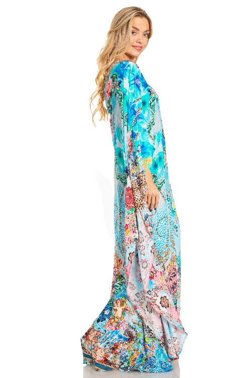 Woman wearing a colorful floral dress on a white background