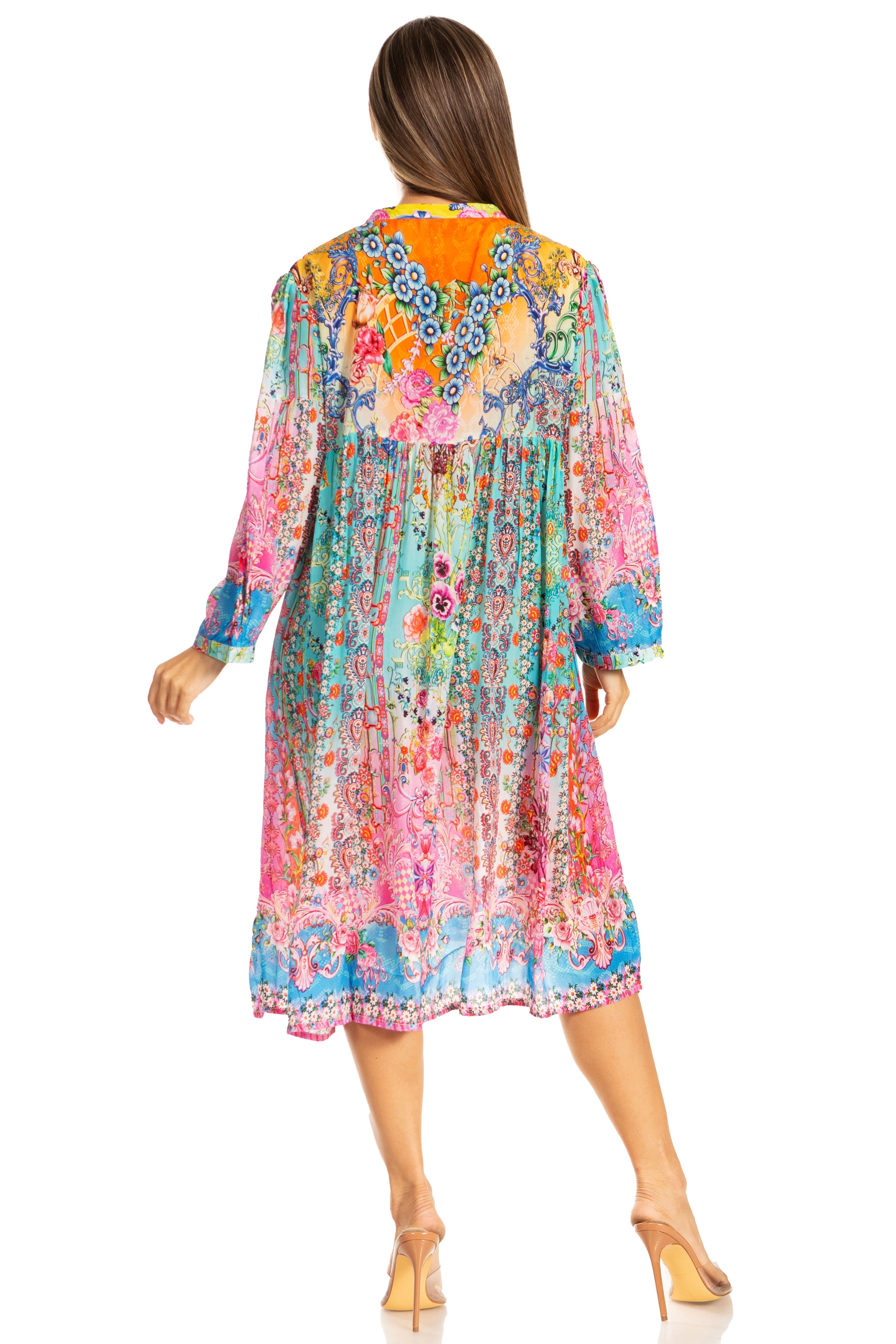 Woman wearing a colorful floral dress on a white background