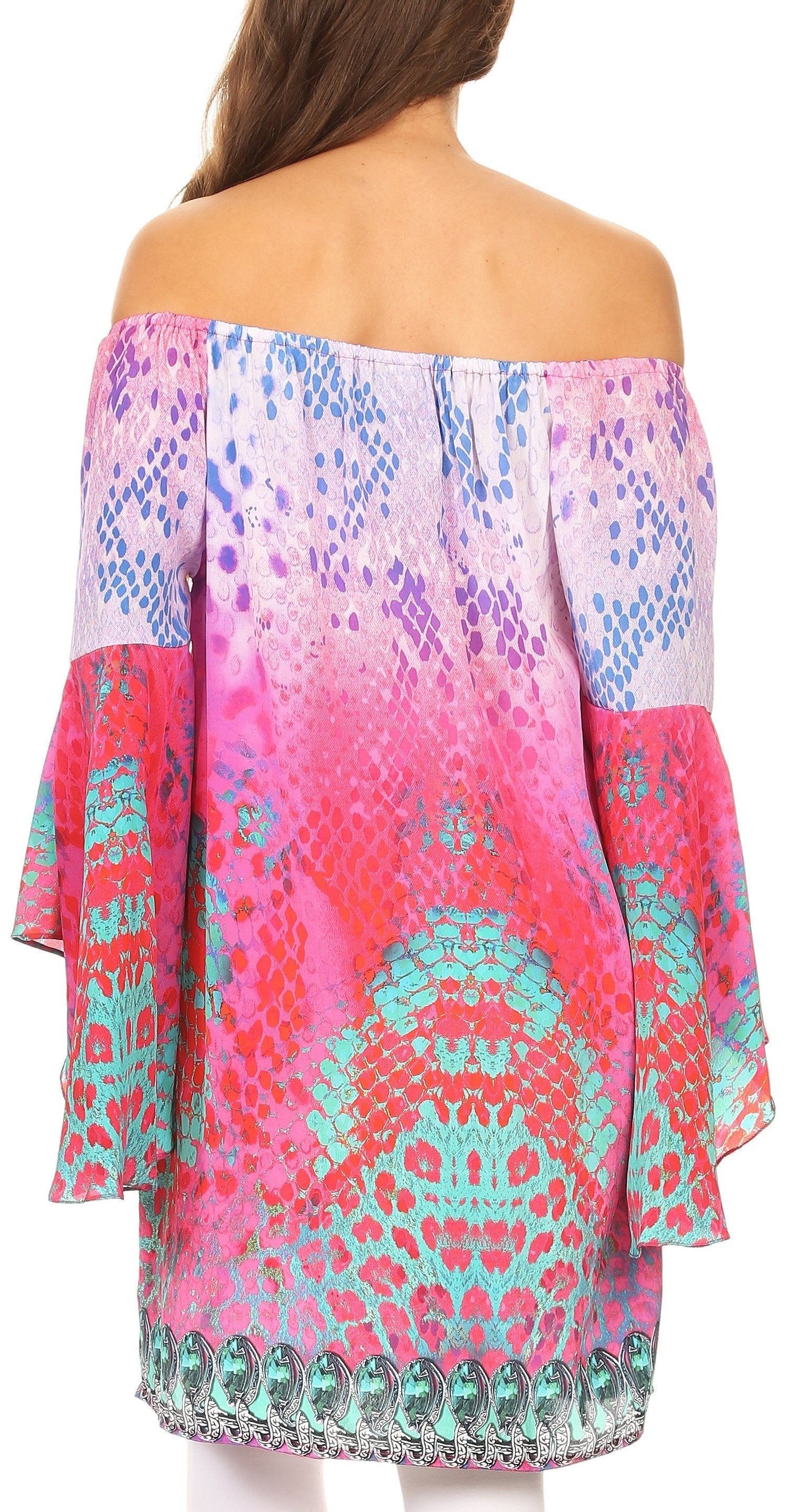 Woman wearing a colorful off-shoulder top with a pattern on a white background