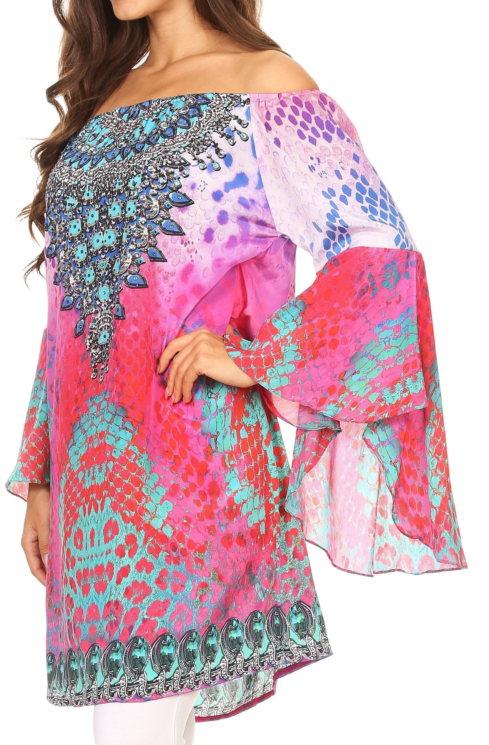 Colorful off-shoulder top with abstract patterns on a white background