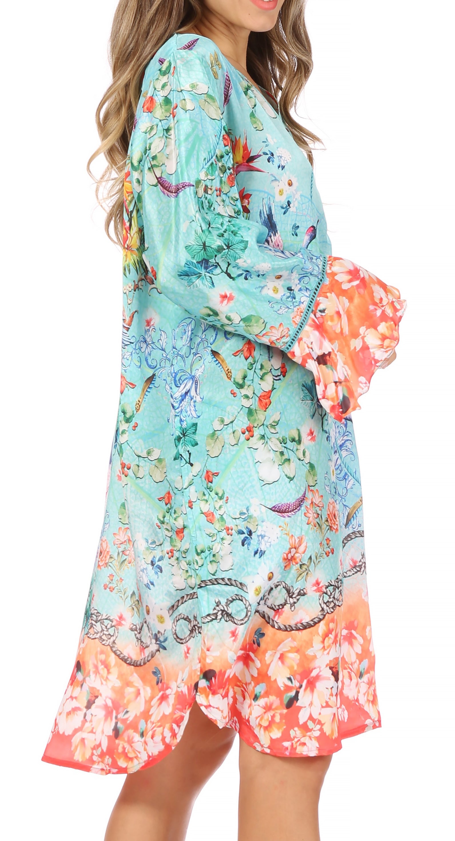 Woman wearing a colorful floral dress with a gradient effect on a white background