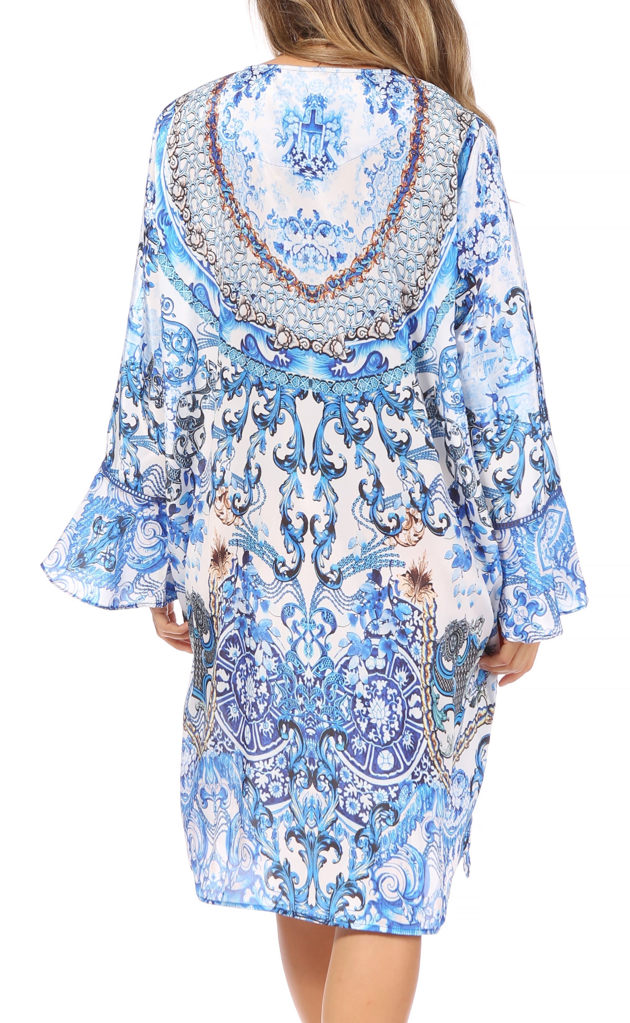 Blue and white patterned dress with a mandala design on a white background