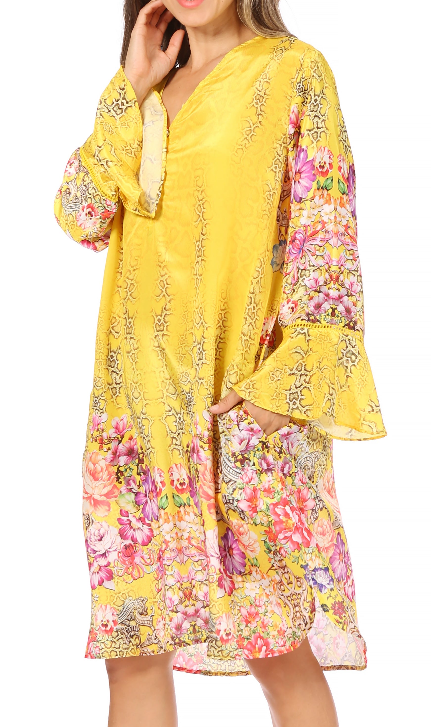 Yellow floral dress with long sleeves on a white background