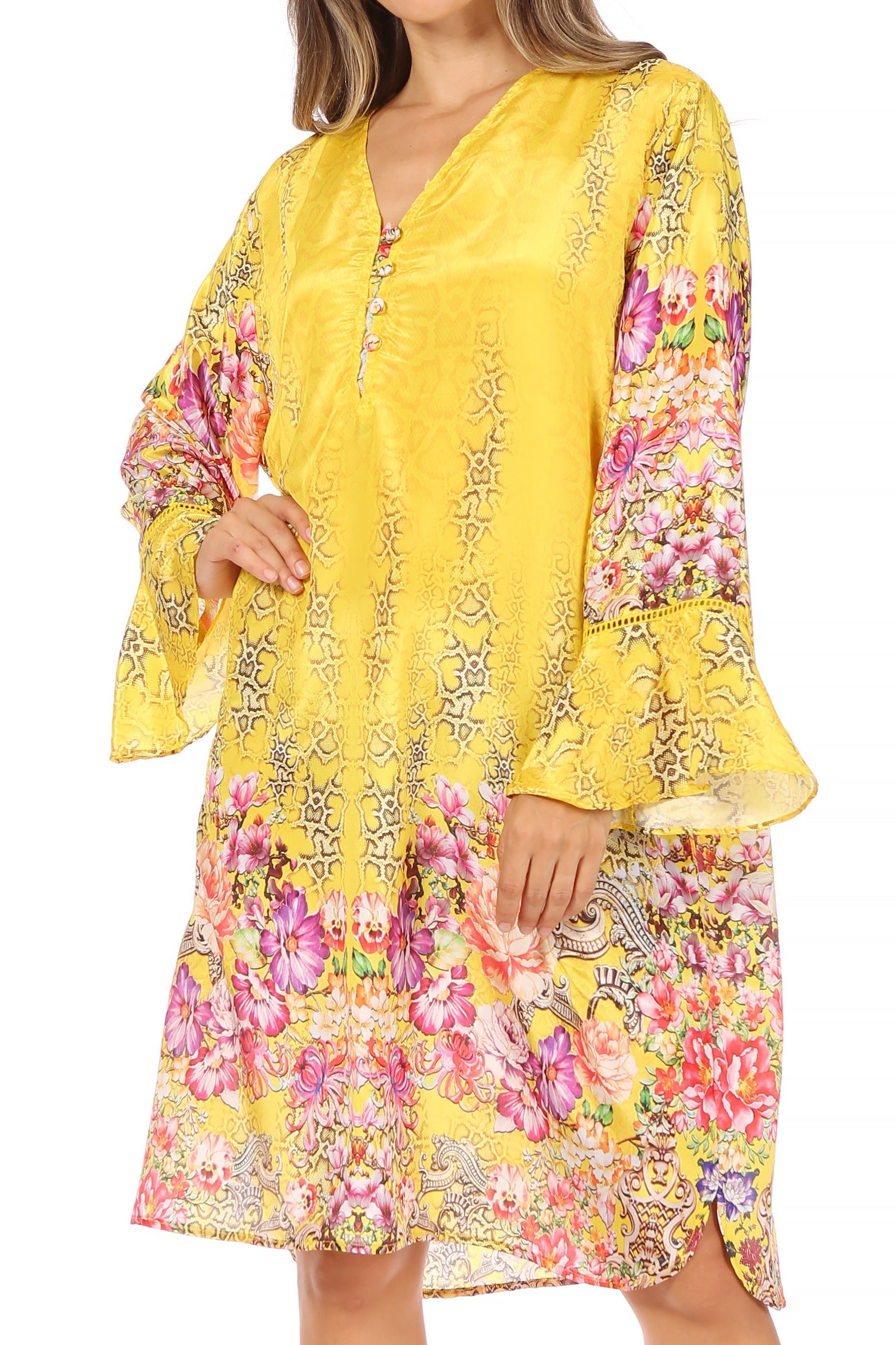 Yellow floral dress with bell sleeves on a white background