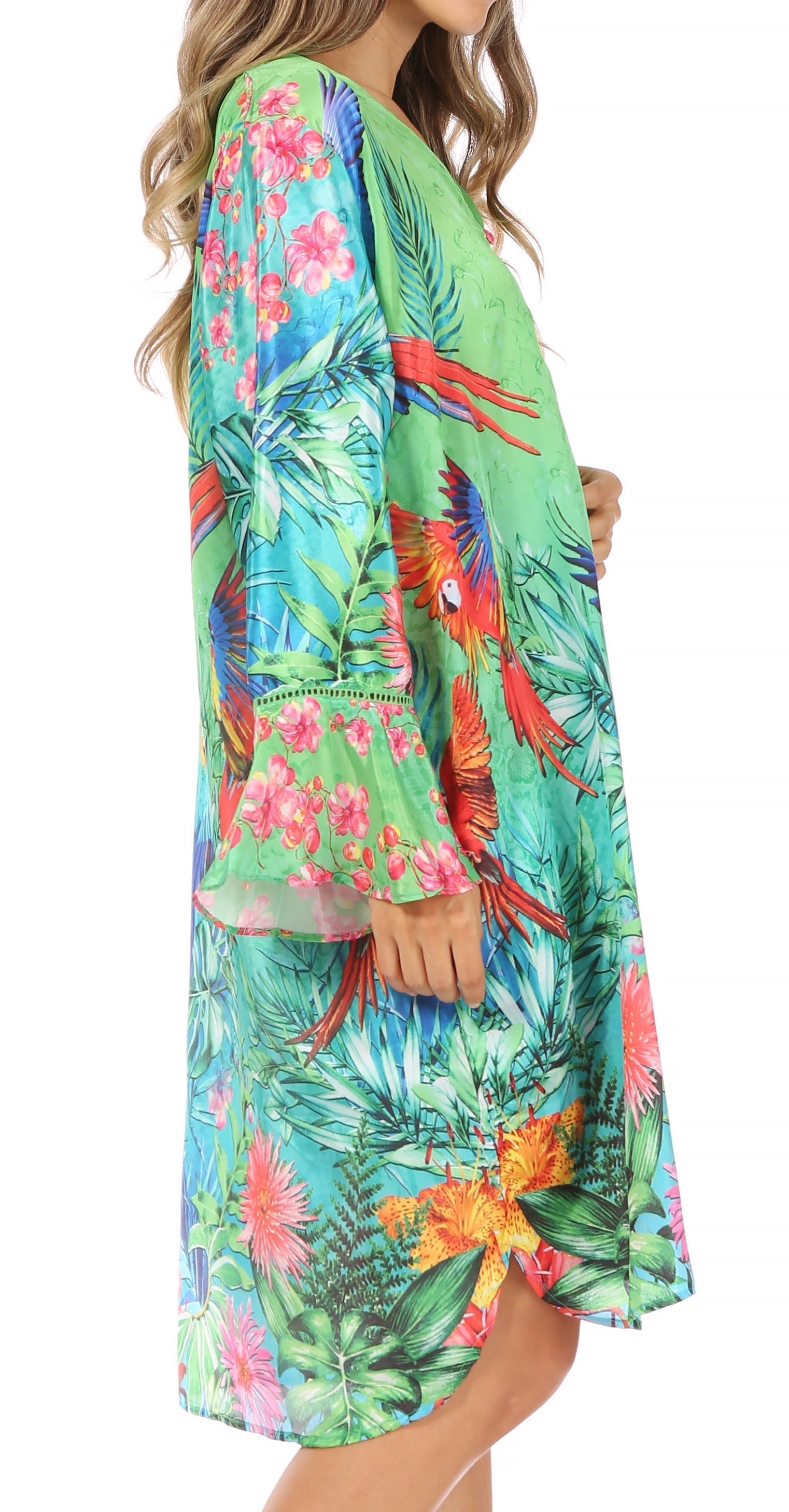 Colorful tropical print dress with long sleeves on a white background