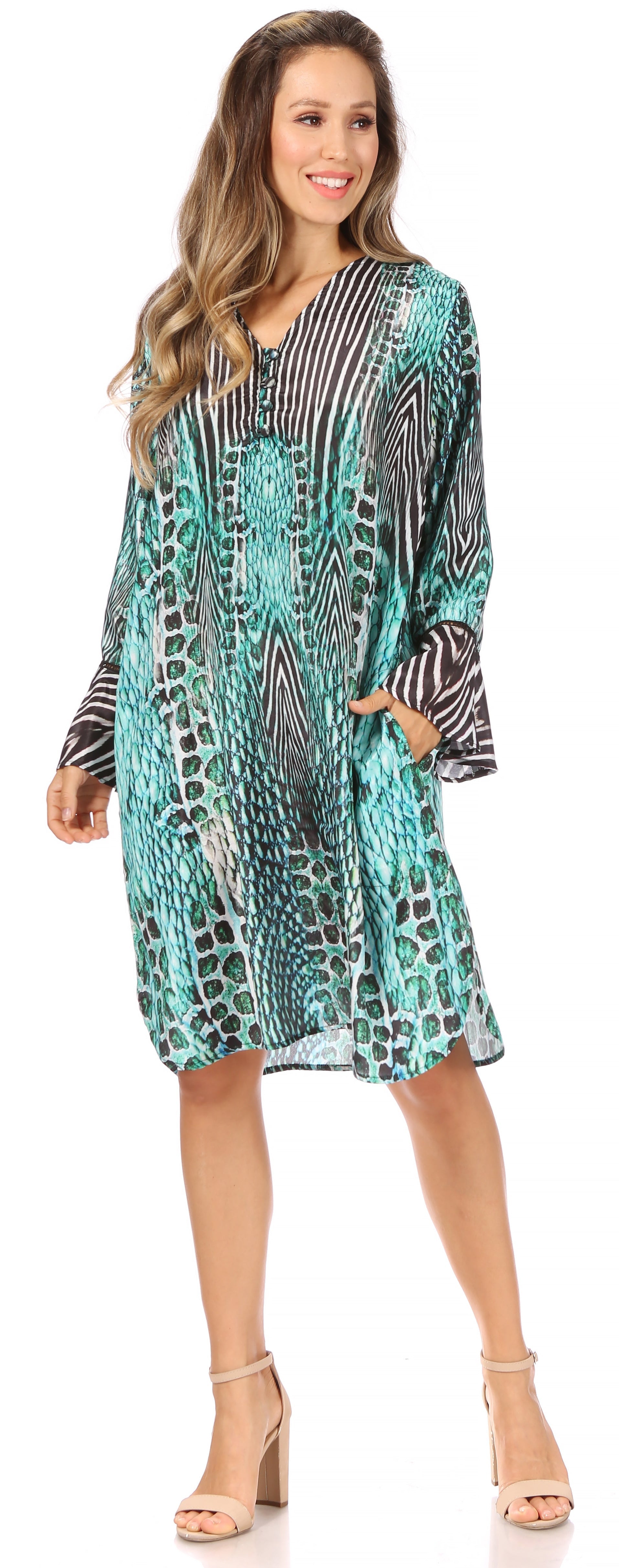 Woman wearing a patterned dress with a white background