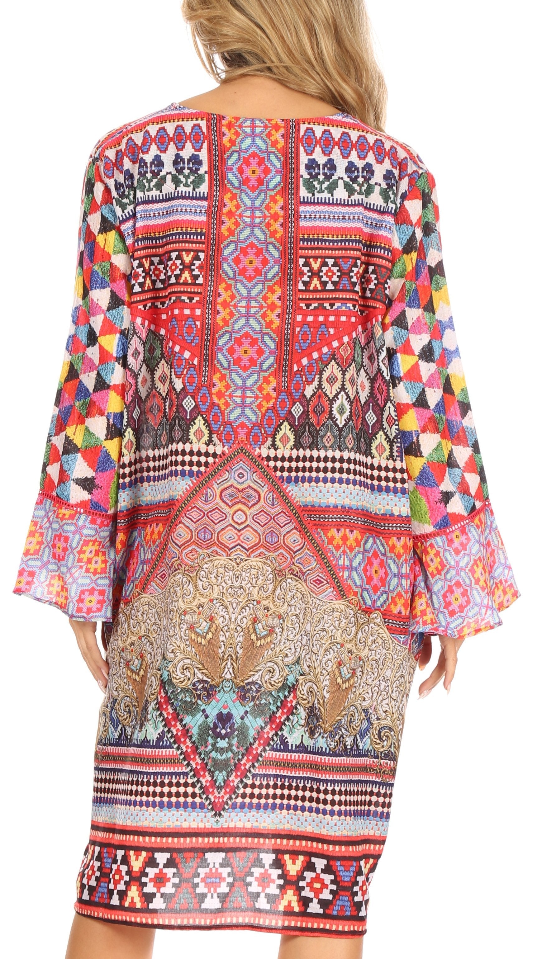 Colorful patterned dress with long sleeves on a white background