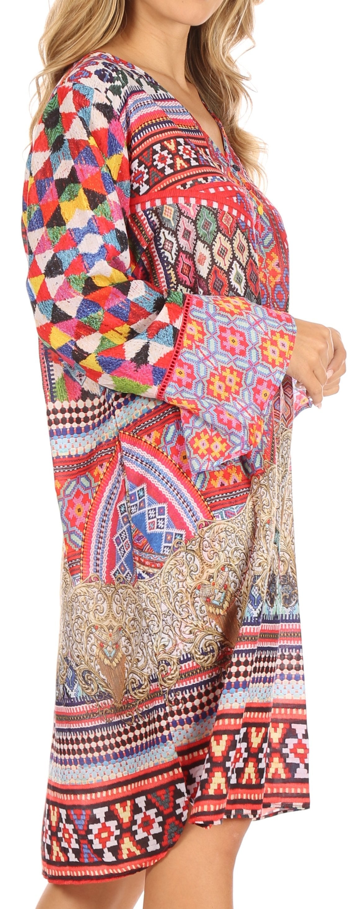Colorful patterned dress with long sleeves held by a person
