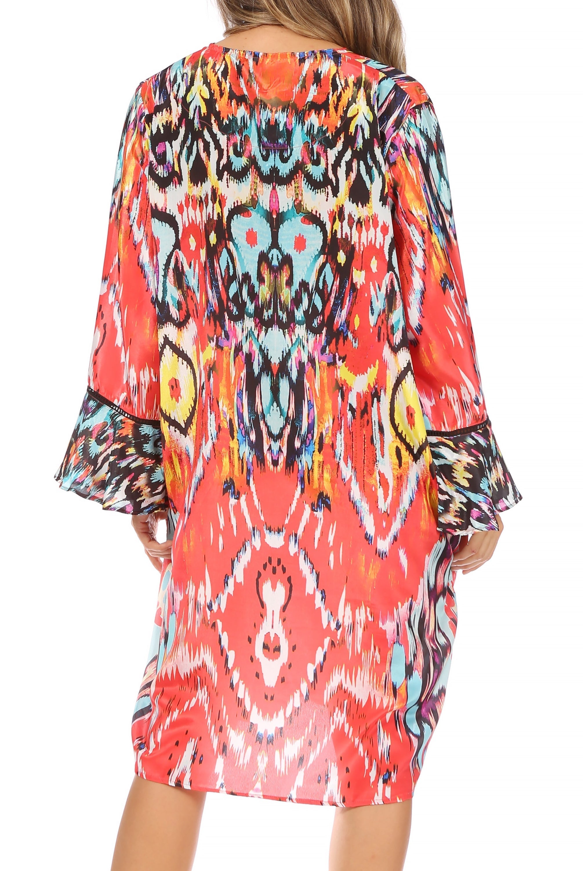 Colorful patterned dress with long sleeves on a white background
