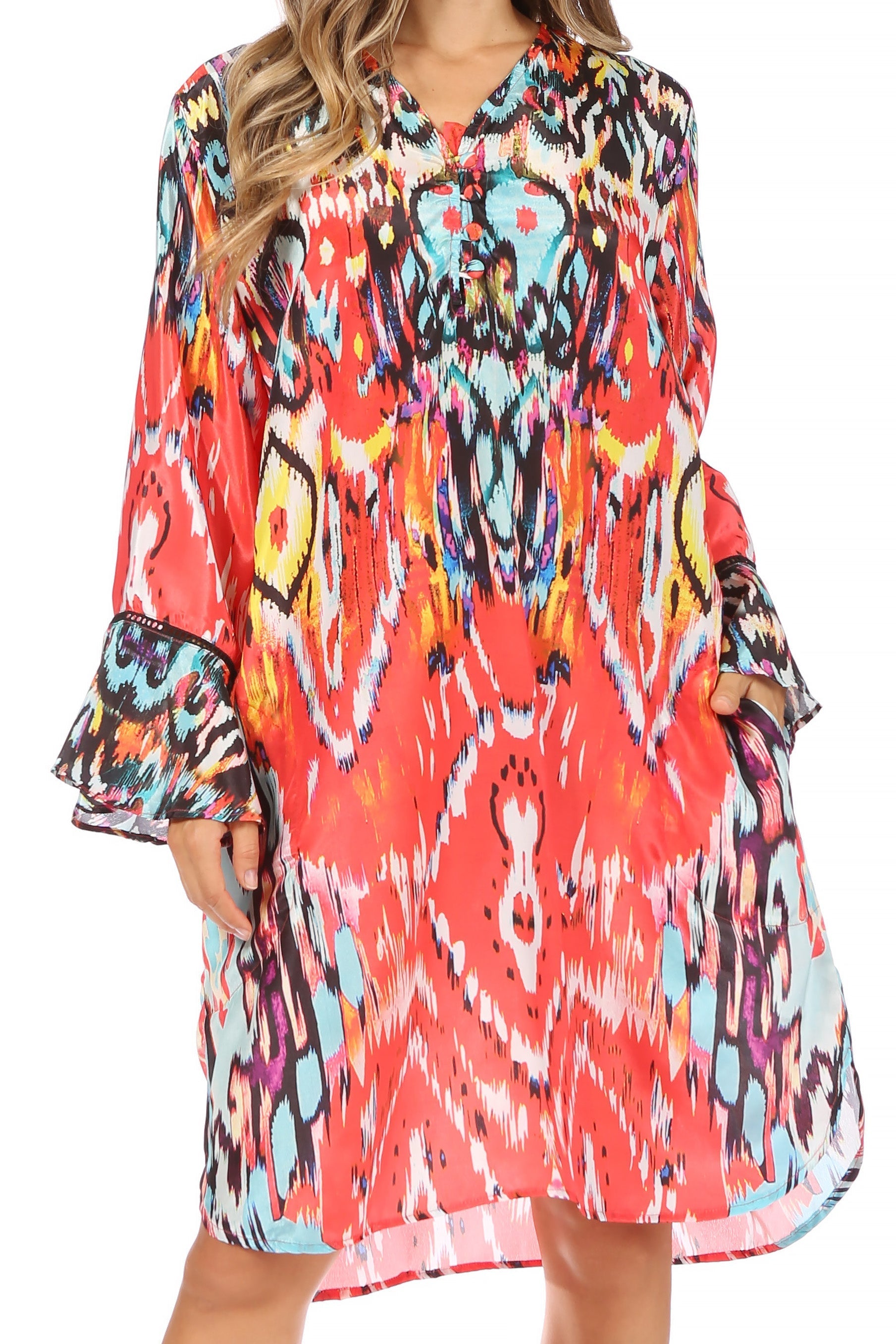 Colorful patterned dress with long sleeves on a white background