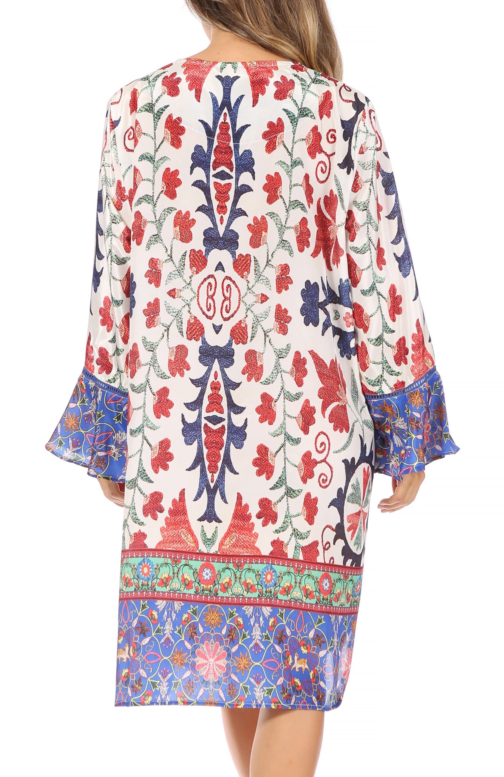 Colorful patterned dress with a brand logo on a white background
