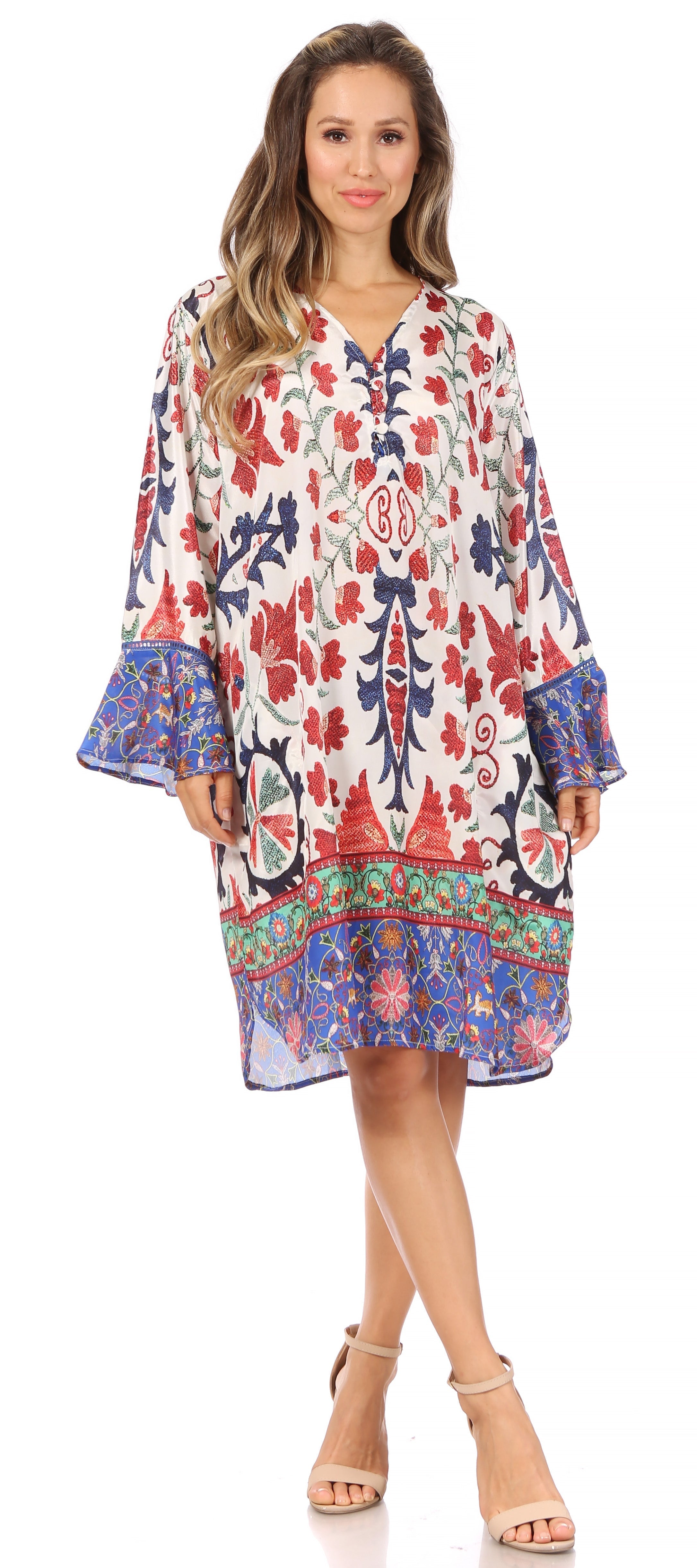 Woman wearing a colorful floral dress on a white background