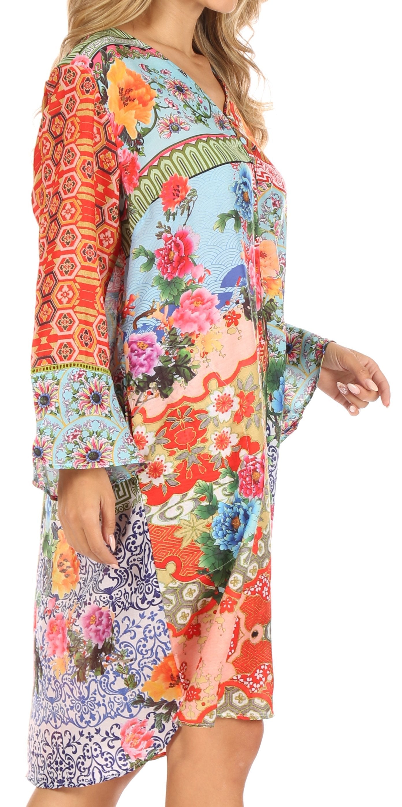 Colorful floral dress with long sleeves on a white background