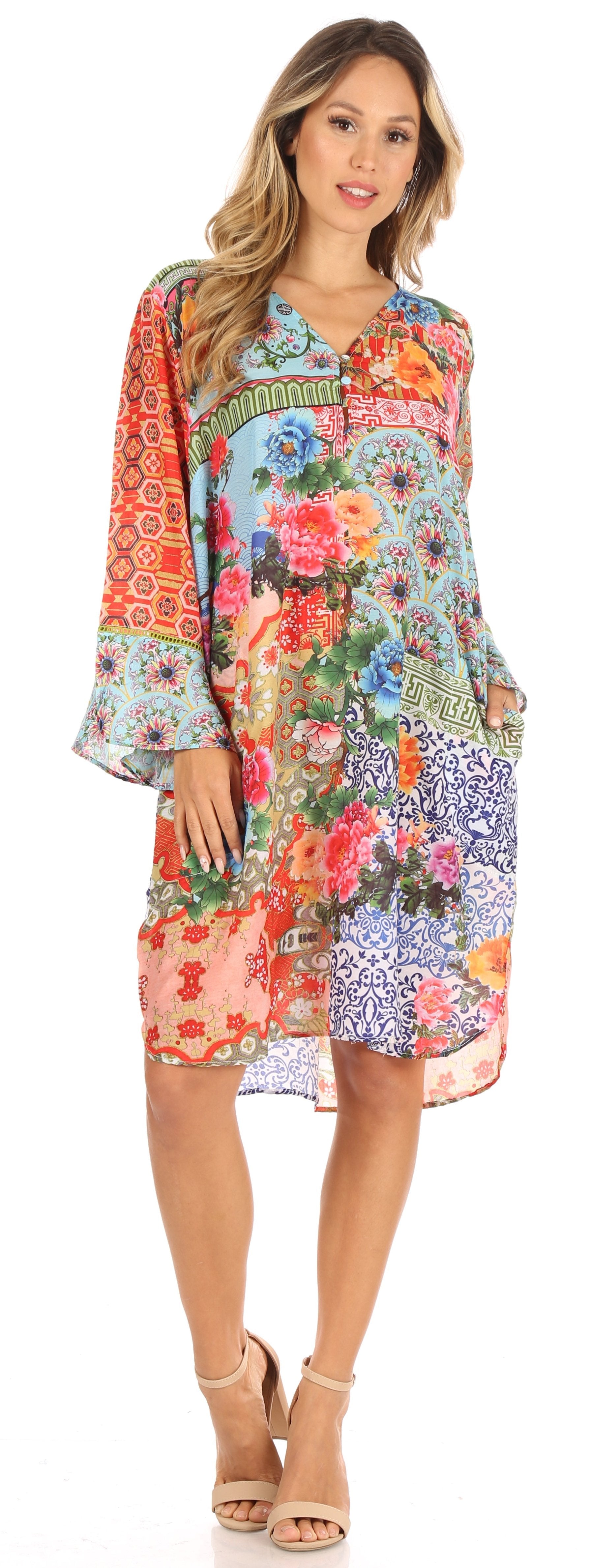 Woman wearing a colorful floral dress on a white background