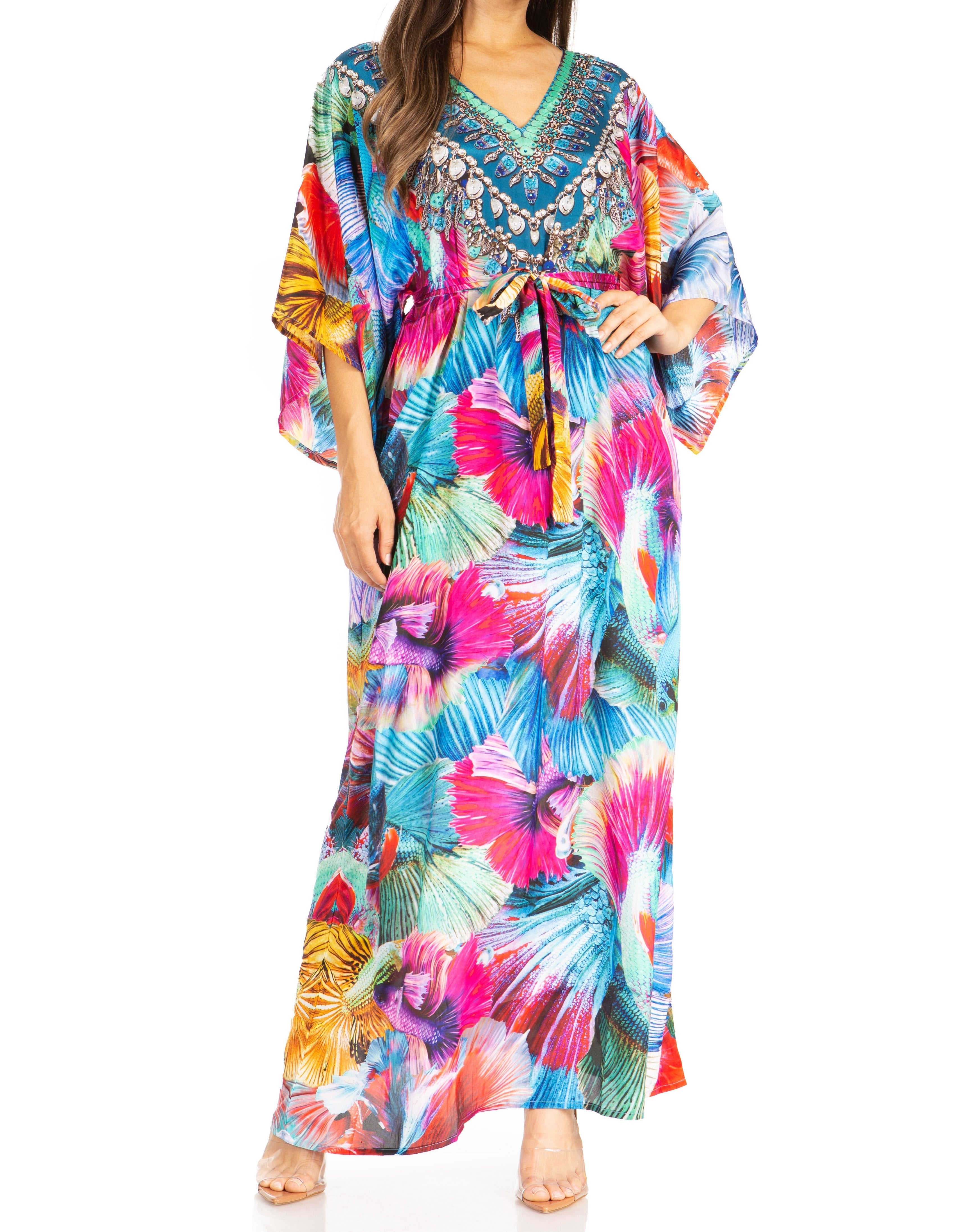 Woman wearing a colorful patterned dress on a white background