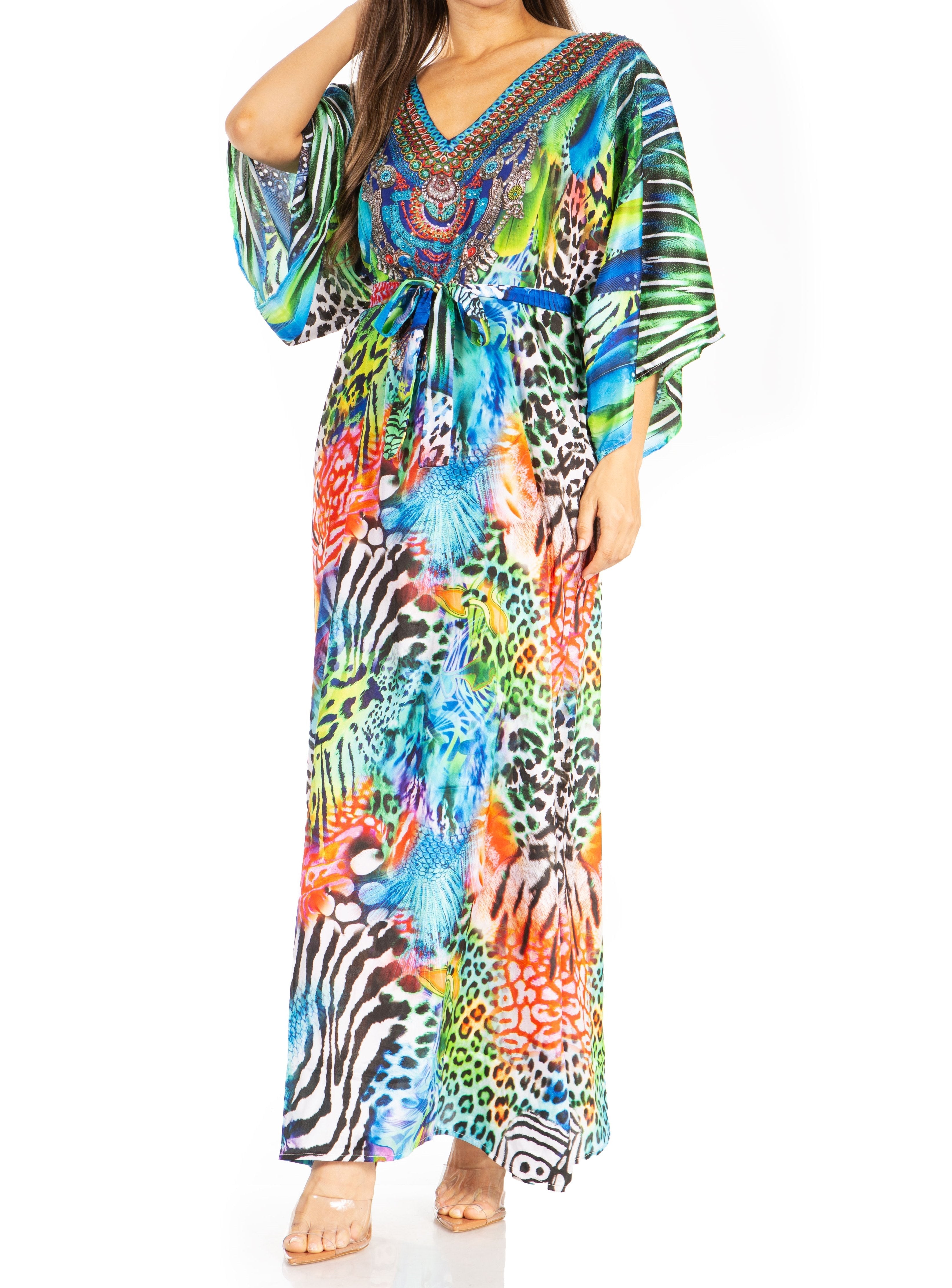 Colorful patterned dress worn by a model on a white background