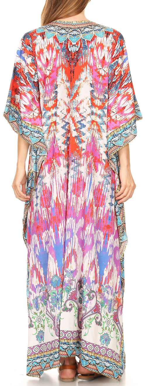 Colorful patterned dress worn by a person on a white background