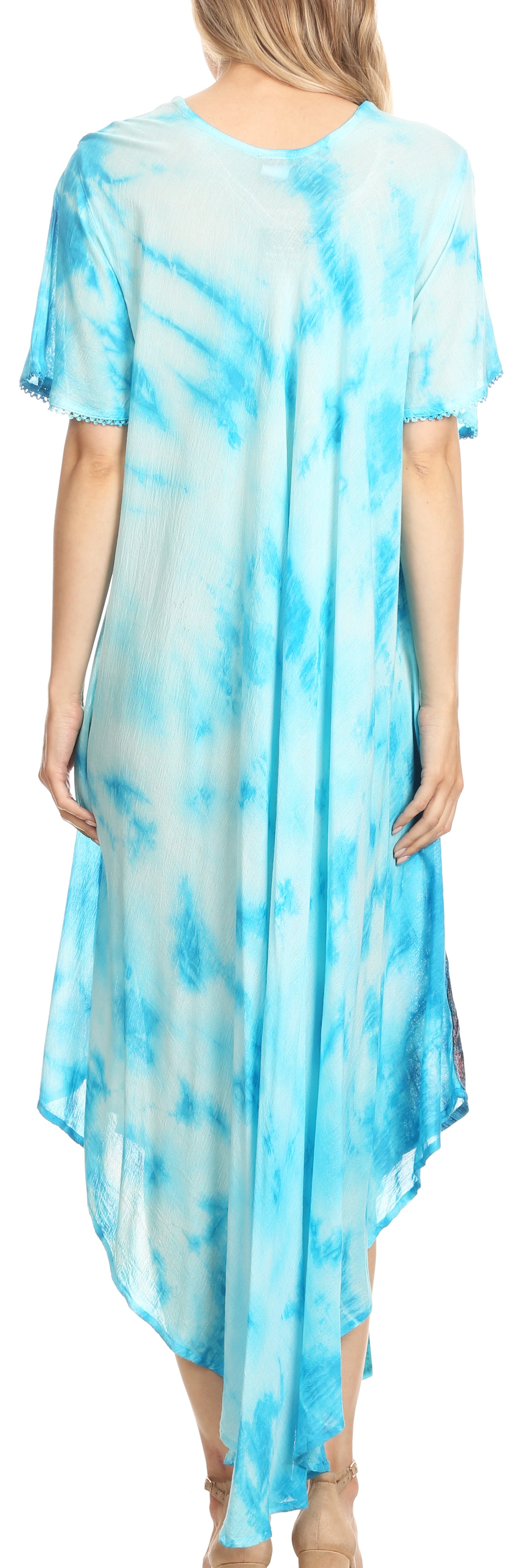 Woman wearing a blue tie-dye dress with a loose fit.