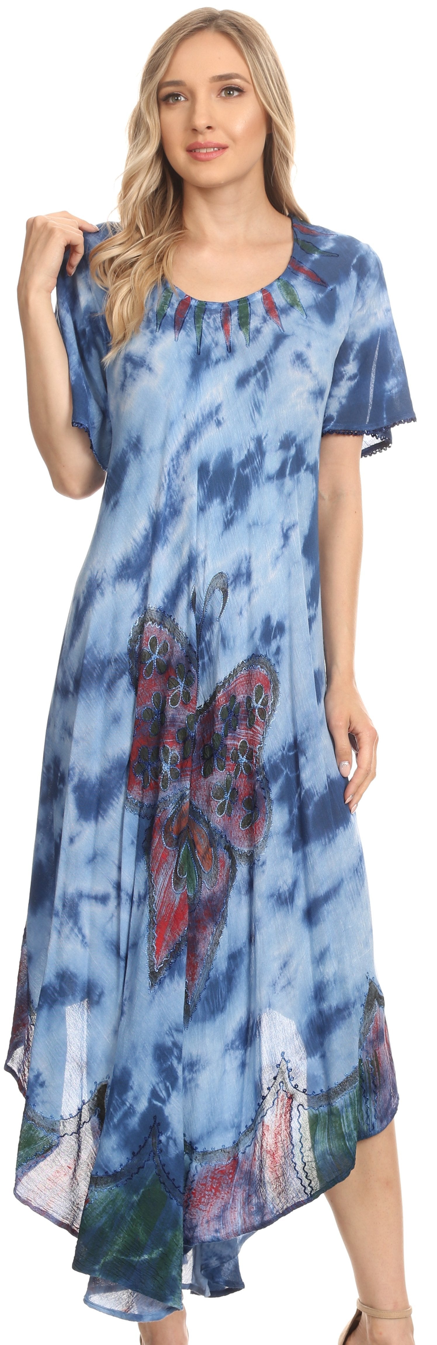 Woman wearing a blue tie-dye dress with butterfly design